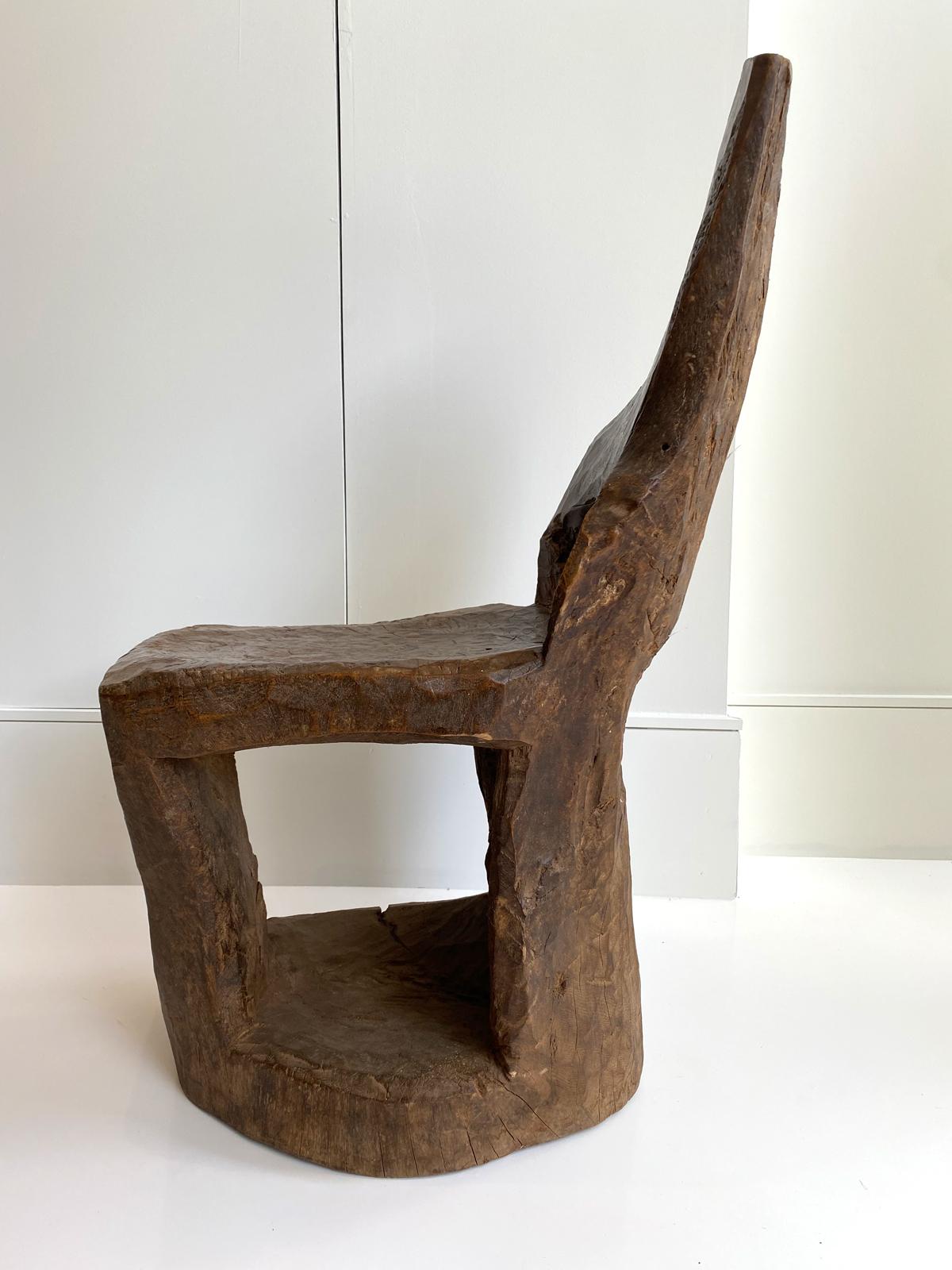 Primitive wooden chair - Organic free form wood stump repurposed into an artistic unique chair with beautiful wood grain finish and hand carving.