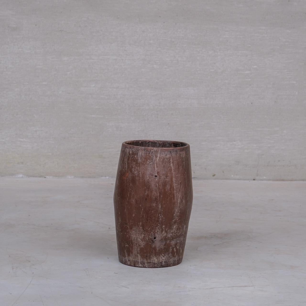 A primitive hollowed wooden circular planter or stick stand.

Belgium, c1950s.

Good vintage condition.

The base has been replaced at some point but too a good standard.

Internal Ref: 03/03/25/024. M/S.

Location: Belgium Gallery.

Dimensions: 52