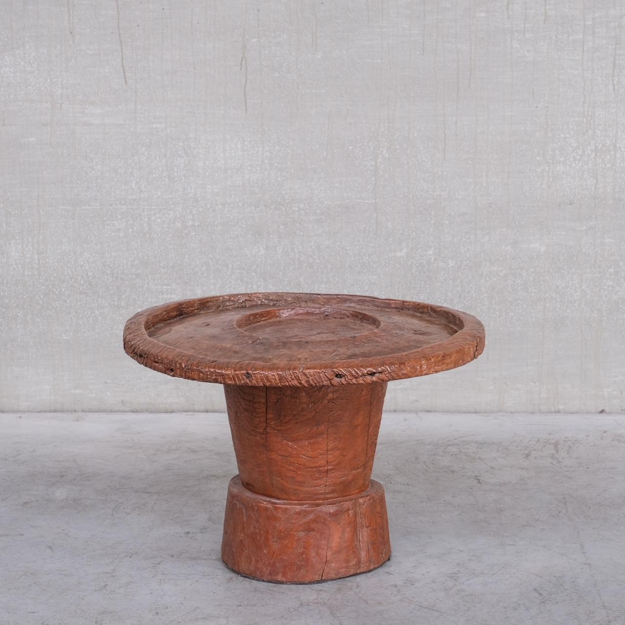 A primitive side or coffee table. 

Souced in France, but likely from Indonesia according to the previous owner. We have listed as mid-20th to be safe but it feels early 20th. 

France, c1950s. 

Unusual primitive form. But very current.