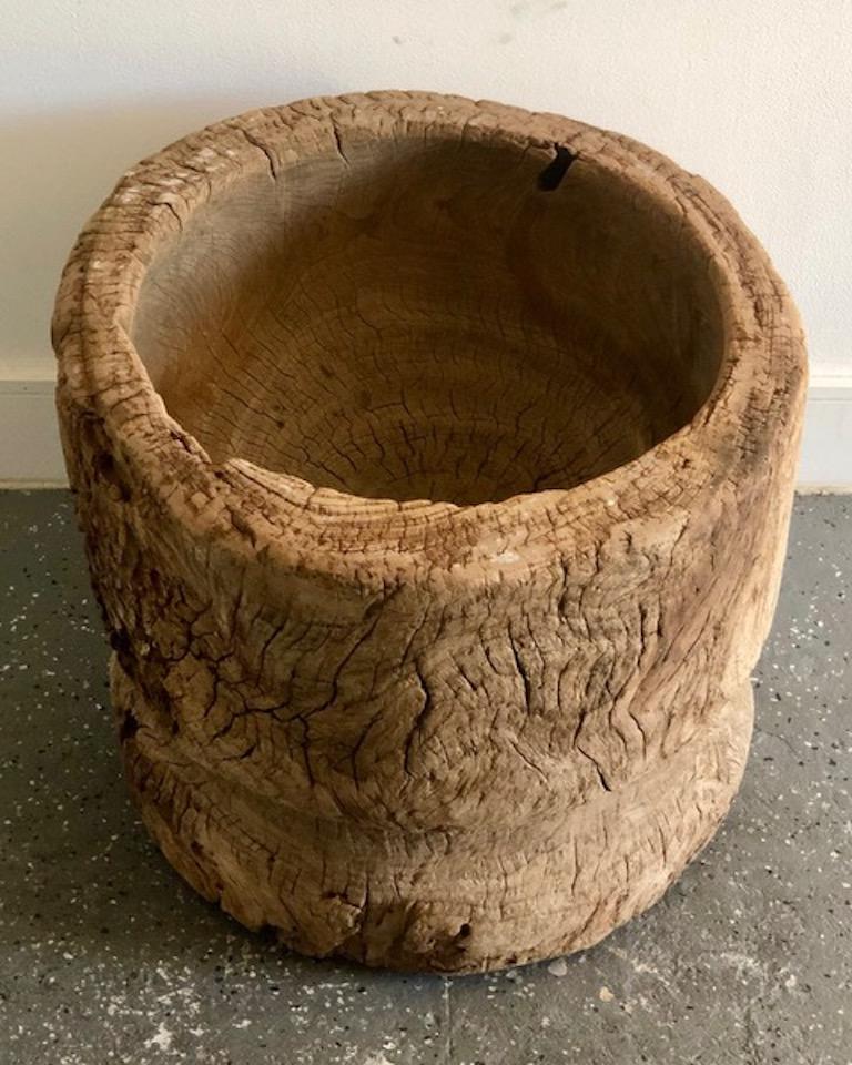 Primitive stump bowl of worn wood with rich brown patina from Japan.