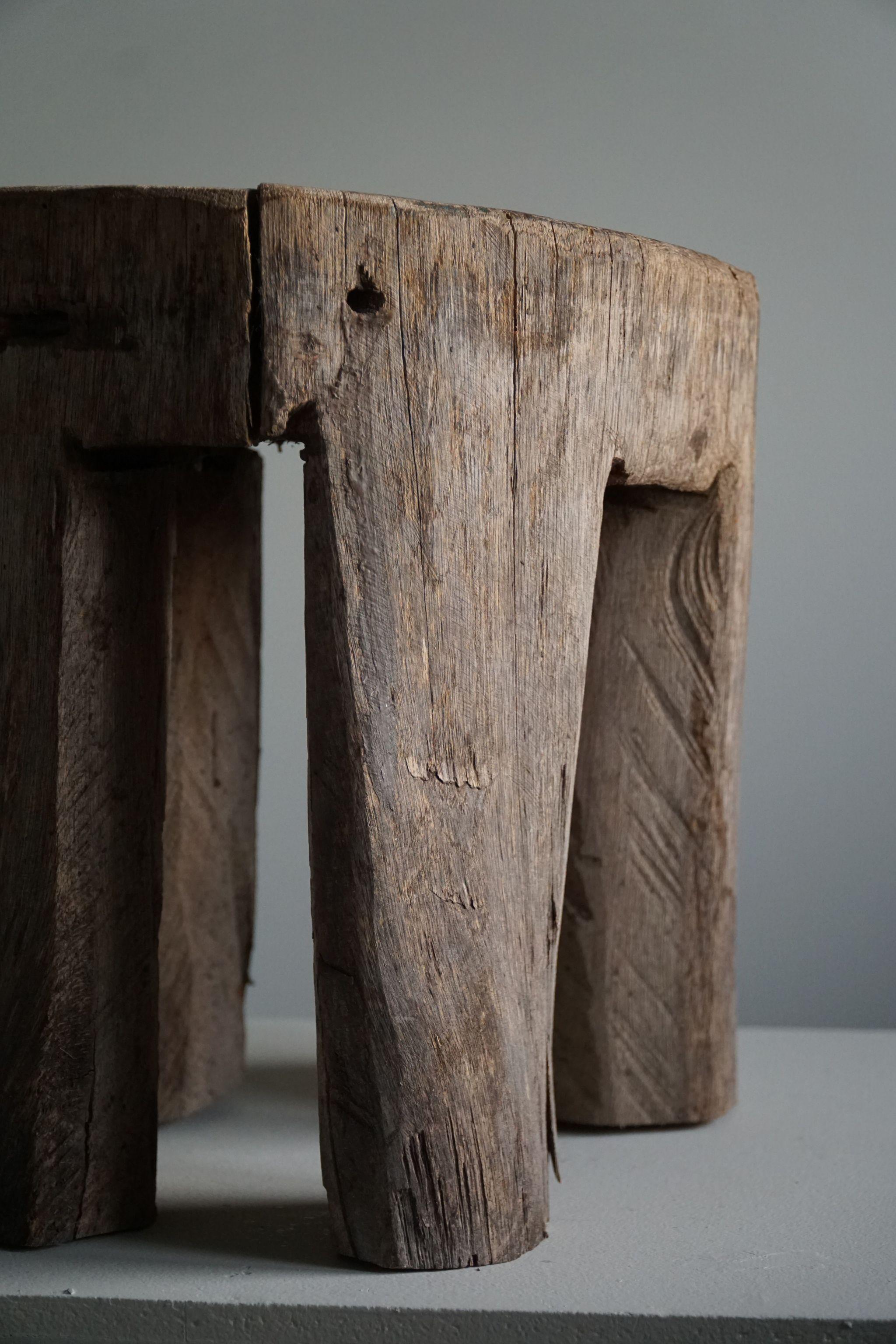 A true decorative organic shape wabi sabi stool in solid wood. Hand carved by a Swedish cabinetmaker in the 1800s.

This primitive stool will fit in many types of home decors as a sculptural object. A modern, Scandinavian or an Art Deco interior