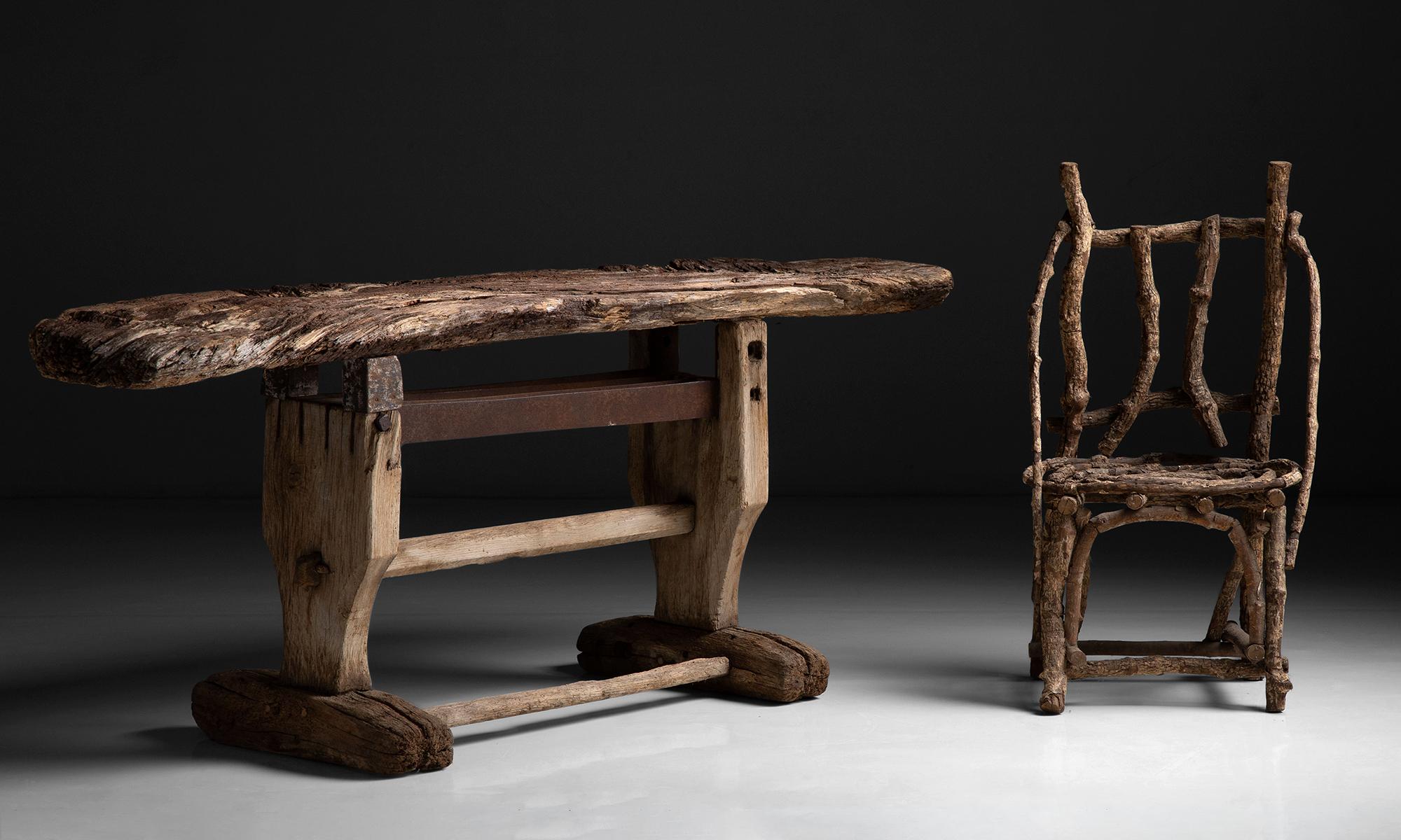 Primitive Work Table / Console

France, circa 1900

Pine woodwork table with iron supports.

76.5”L x 21”D x 29.5”H.