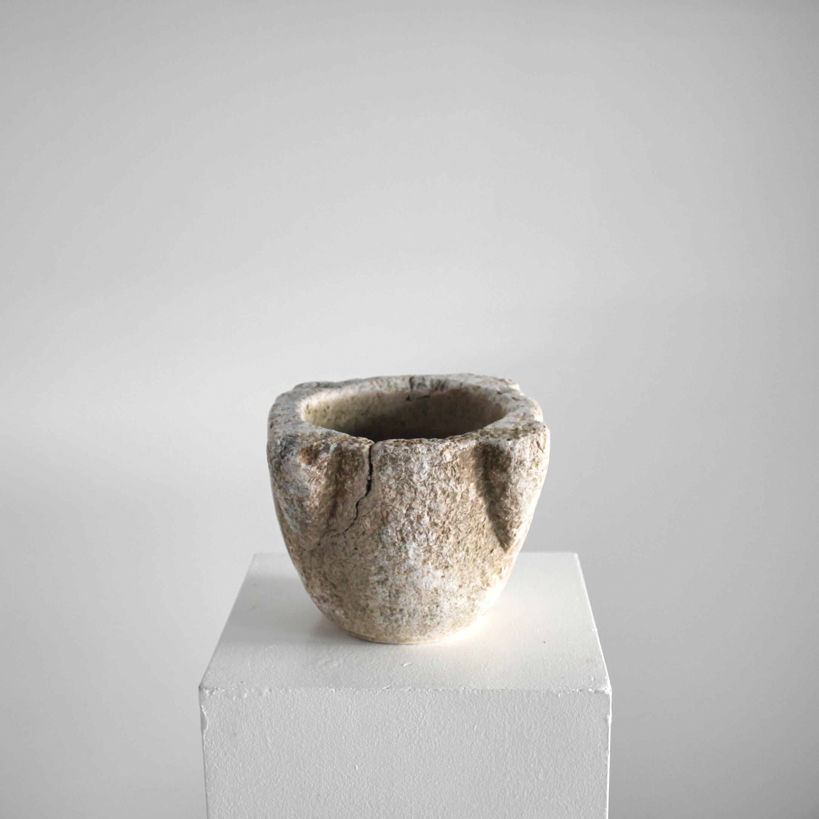 An XL hand carved Catalan stone mortar from the 18th C.

Heavily worn with exceptional patination & lovely light colour.