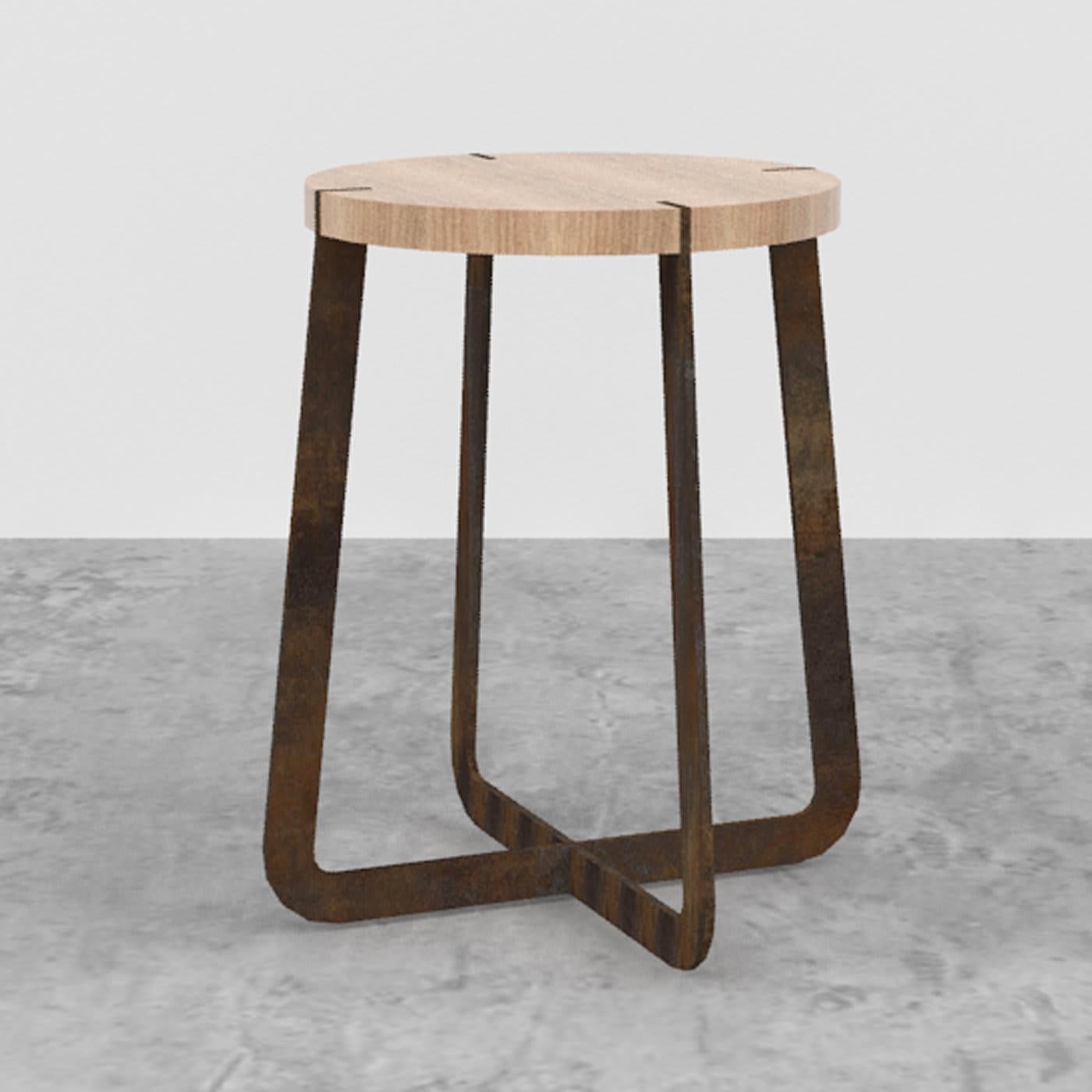 The name of this elegantly crafted stool recalls the territory from where it originates, Puglia, one of the most fascinating places in the Mediterranean. The painted steel structure is comprised of two crossing elements, supporting a round seat in