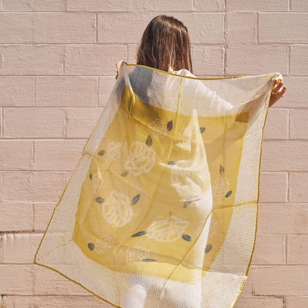 Custom design by Studio variously, Primrose Turmeric is one of a kind silk organza scarf . It is made by master shibori artisans in India.

A sustainable design brand based out of Michigan, Studio Variously exclusively collaborates with artisan