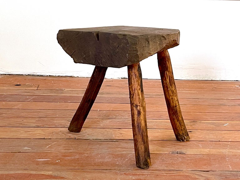 Primitive solid wood log stool with tripod base
France, circa 1940s or earlier 
Great patina and shape.