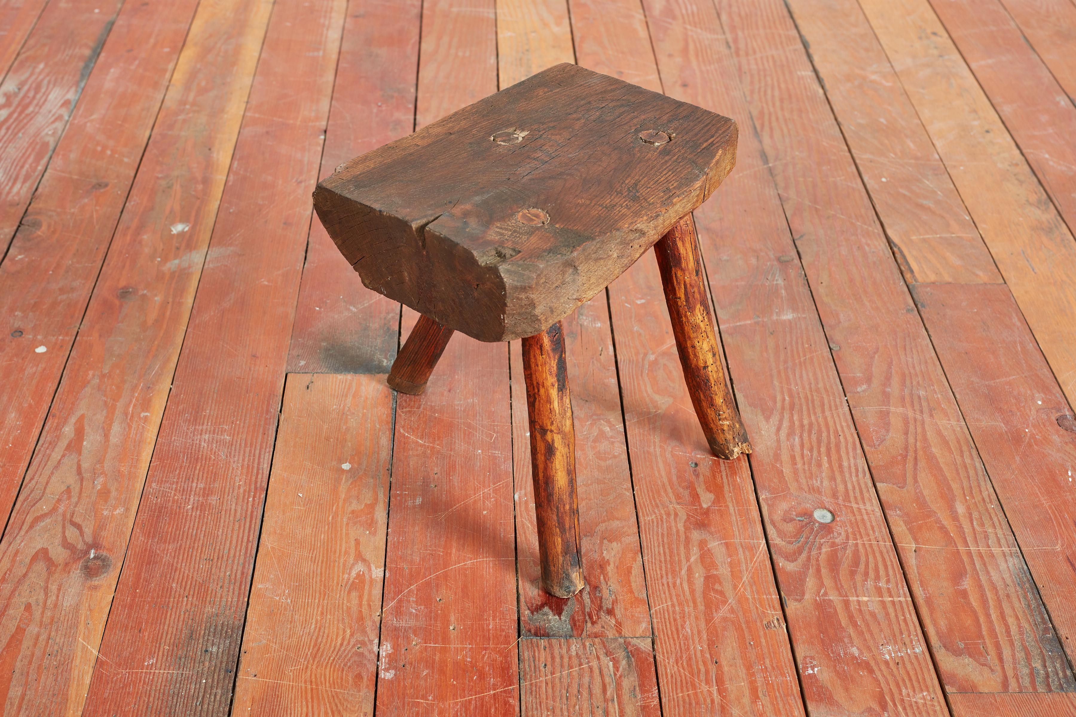 Primitive solid wood log stool with tripod base
France, circa 1940s or earlier 
Great patina and shape.