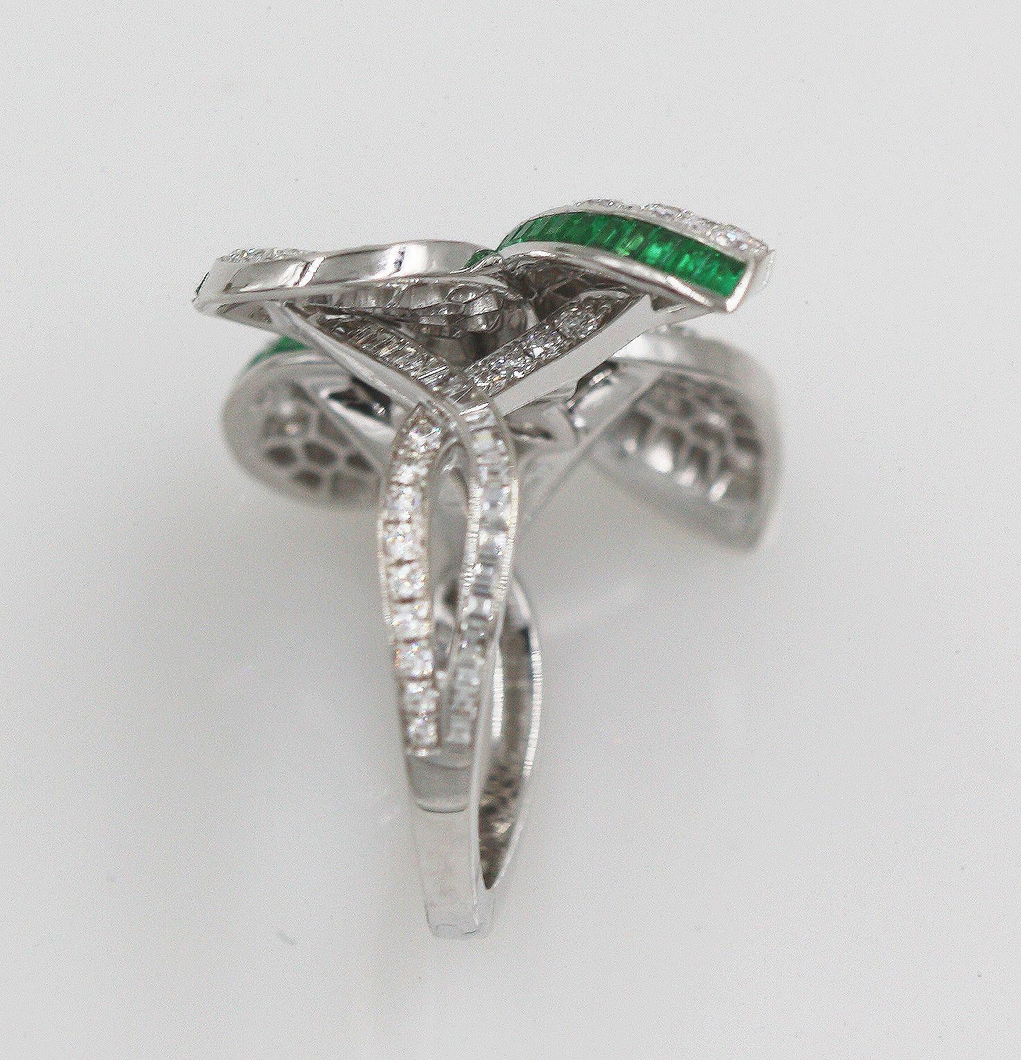 Ring Size: 50; US: 5.5 (This Ring can be resize by Boutique)
34 Baguette Diamonds weighing approx. 0.29 Carats. Clarity: VS+
139 Round Diamonds weighing approx. 1.75 Carats. Clarity: VS+
48 Baguette Emeralds weighing approx. 0.57 Carats. 
Total