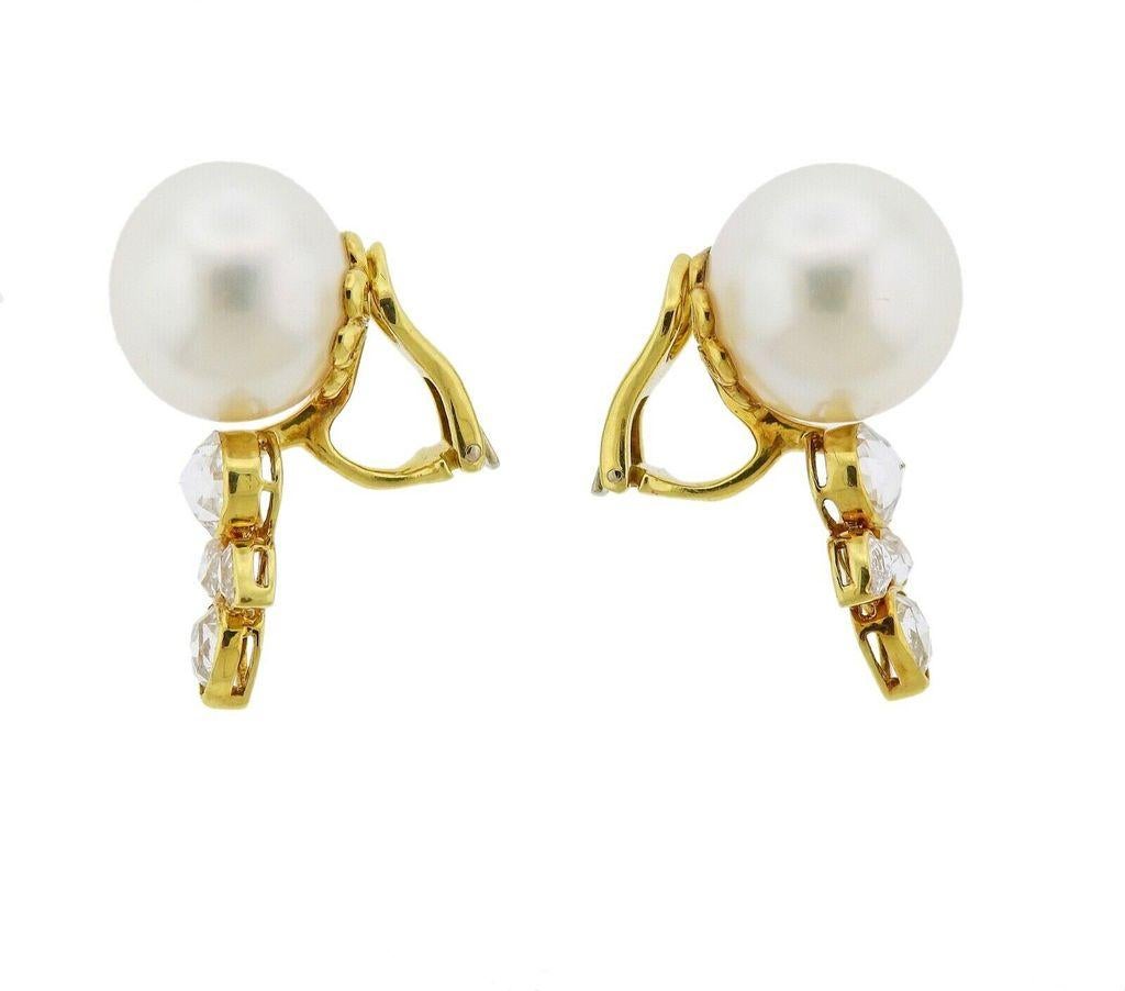 18k gold earrings crafted by Assael for Prince Dimitri. Earrings feature approx 2.85ctw in rose cut diamonds and 14.7mm south sea pearls. Retail is $19200. Earrings are 30mm long. Total weight 15.7 grams. Marked 750. 

