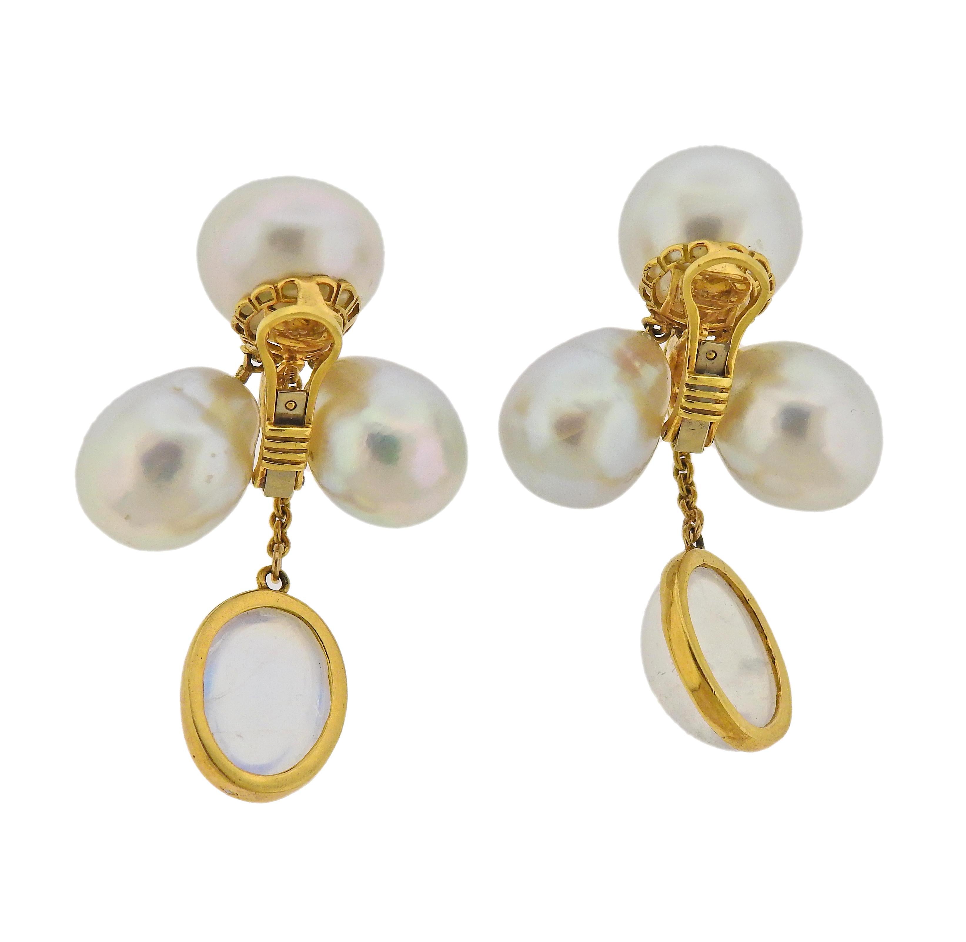 Pair of 18k  gold earrings with 12.1-15.3mm South Sea pearls and approx. 17.03ctw moonstones, crafted by Assael for Prince Dimitri. Retail $7300. Earrings are 49mm long x 26mm wide. Weight - 28.9 grams. Marked: 750.