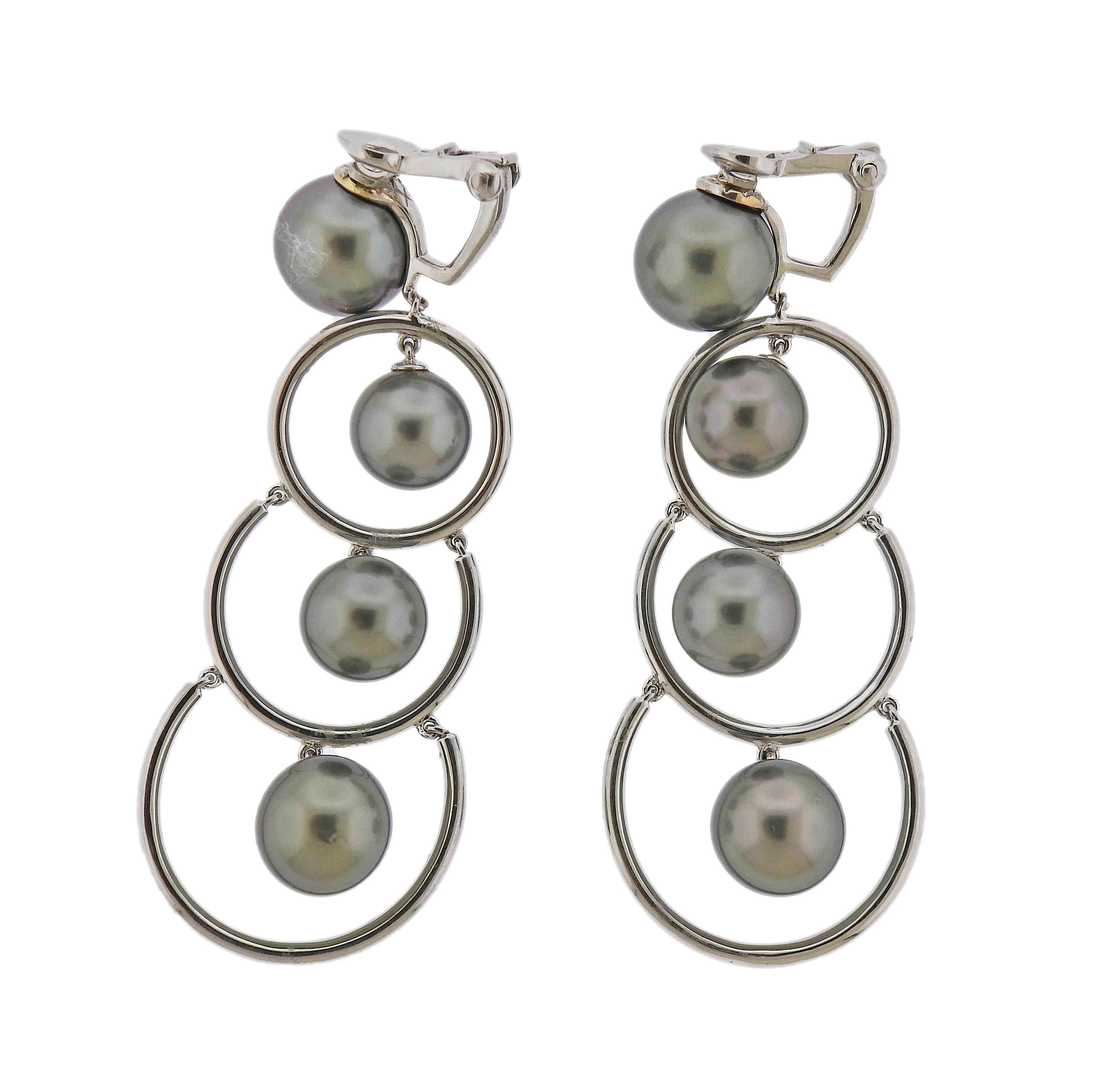 Pair of long 18k white gold earrings with 9.1 - 10.6mm Tahitian pearls, crafted by Assael for Prince Dimitri. Retail $4500. Earrings are 60mm long x 25mm wide. weight - 25. 9 grams. Marked: A mark, Prince Dimitri mark, 750.