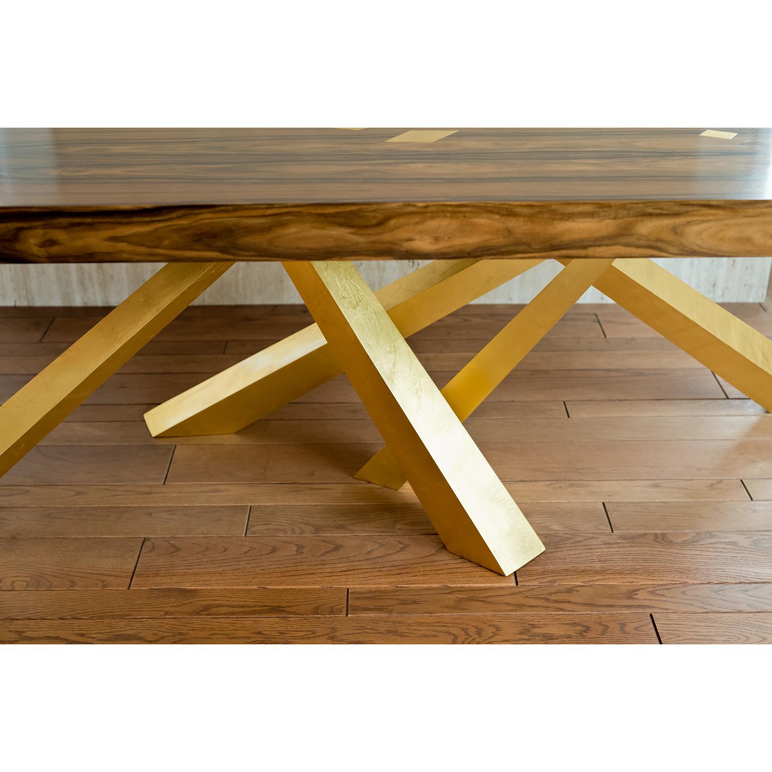 This beautiful table plays with the idea of balance and harmony while at the same time embracing a sense tension. The legs are precisely engineered to be perfectly stable even though it feels almost as if they just happened to fall that way.