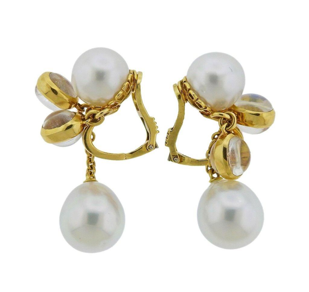 Brand new pair of Assael for Prince Dimitri 18k yellow gold drop earrings, set with moonstones and 12-13.3mm South Sea pearls. Retail $7300. Earrings are 44mm long. Weight is 23.3 grams. Marked Prince Dmitri mark, 18k.