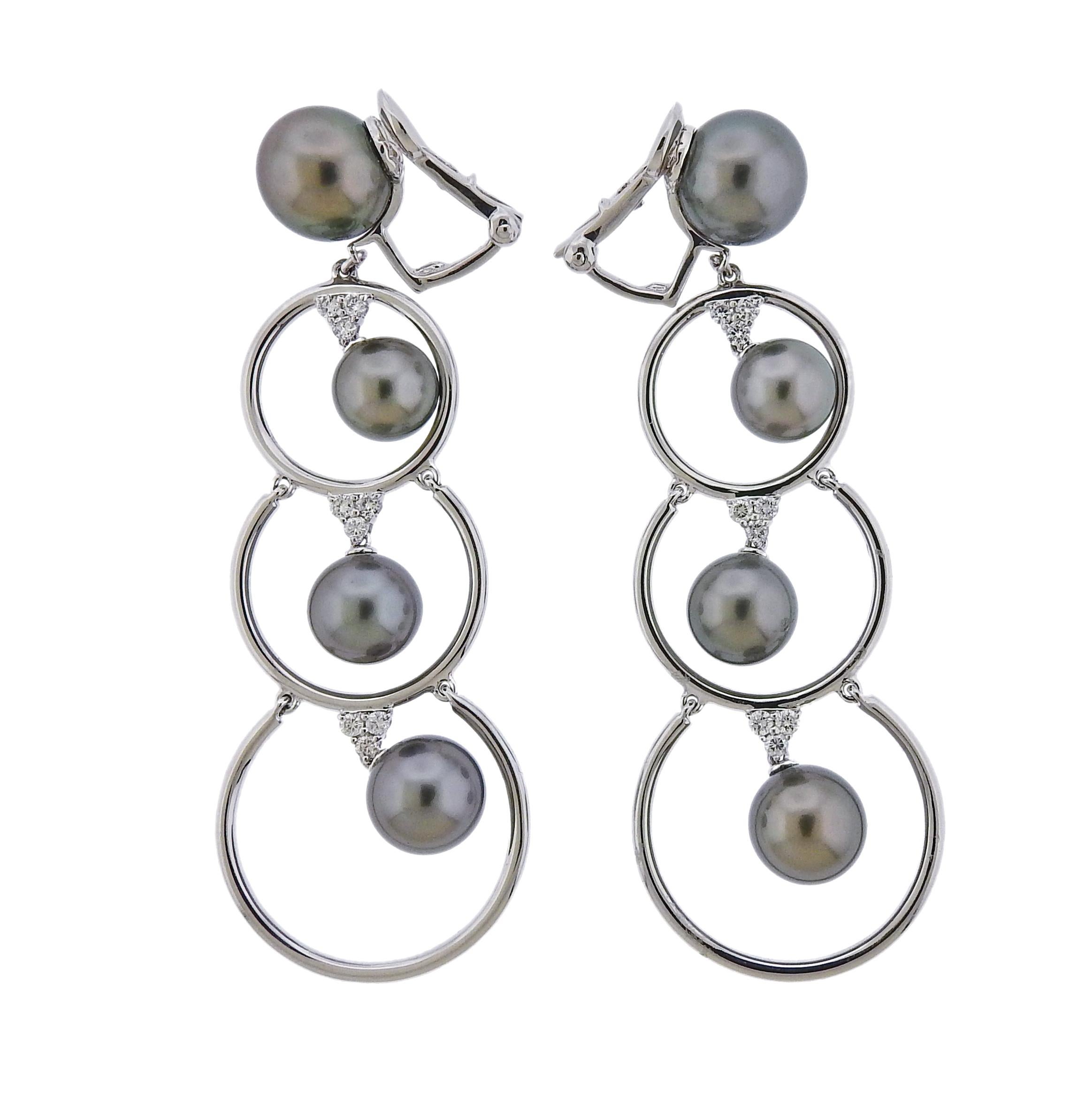 Brand new pair of 18k white gold long earrings by Assael for Prince Dimitri, set with 8.5mm - 10.5mm Tahitian pearls and 0.55ctw in G/VS diamonds. Retail $8100.  Earrings are 72mm x 25mm.  Weigh 26.5 grams. Marked: 18k, 750 3.