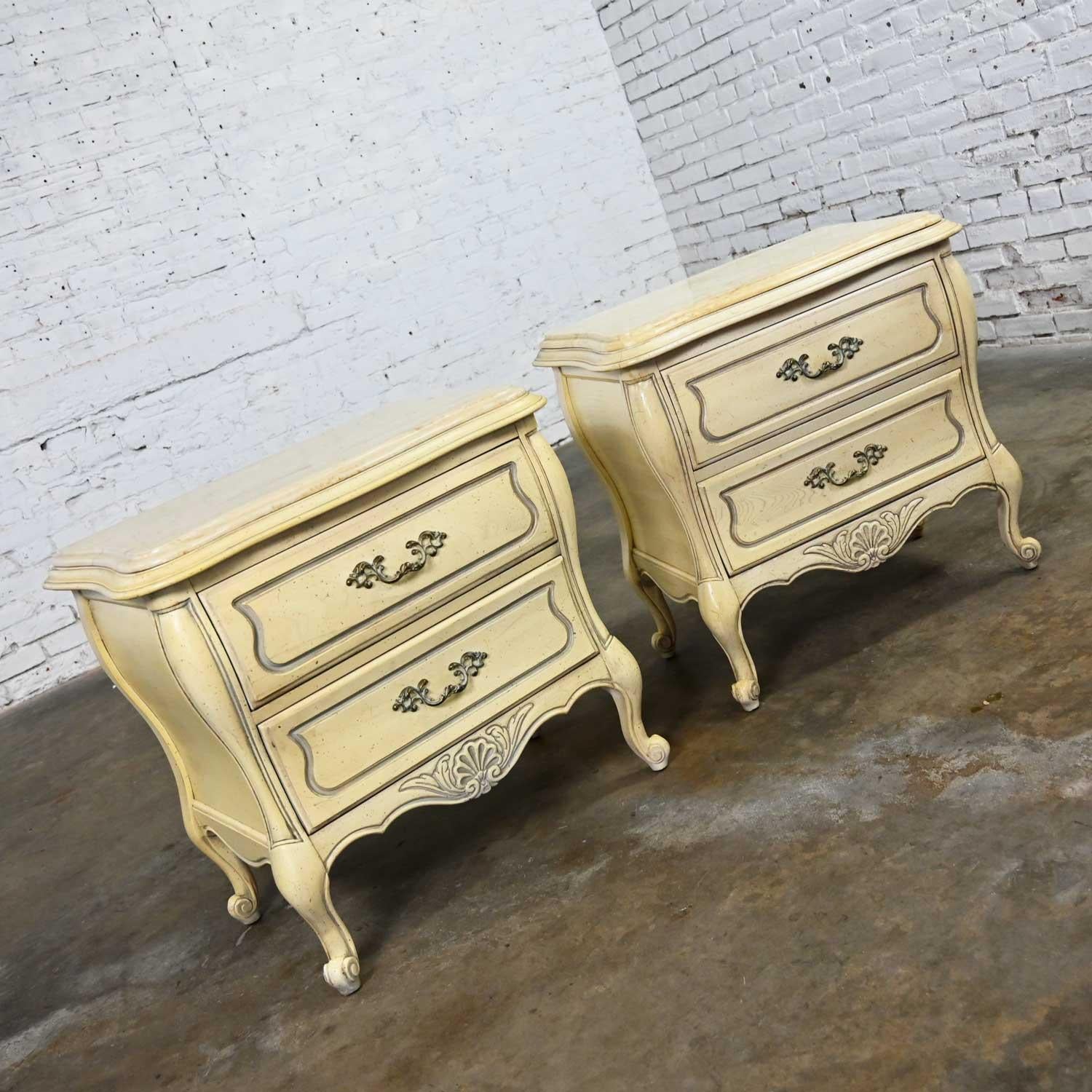 Fabulous pair of French Provincial Hollywood Regency antique white nightstands with removeable marble tops by the Prince Howard Furniture Company. Beautiful condition, keeping in mind that these are vintage and not new so will have signs of use and