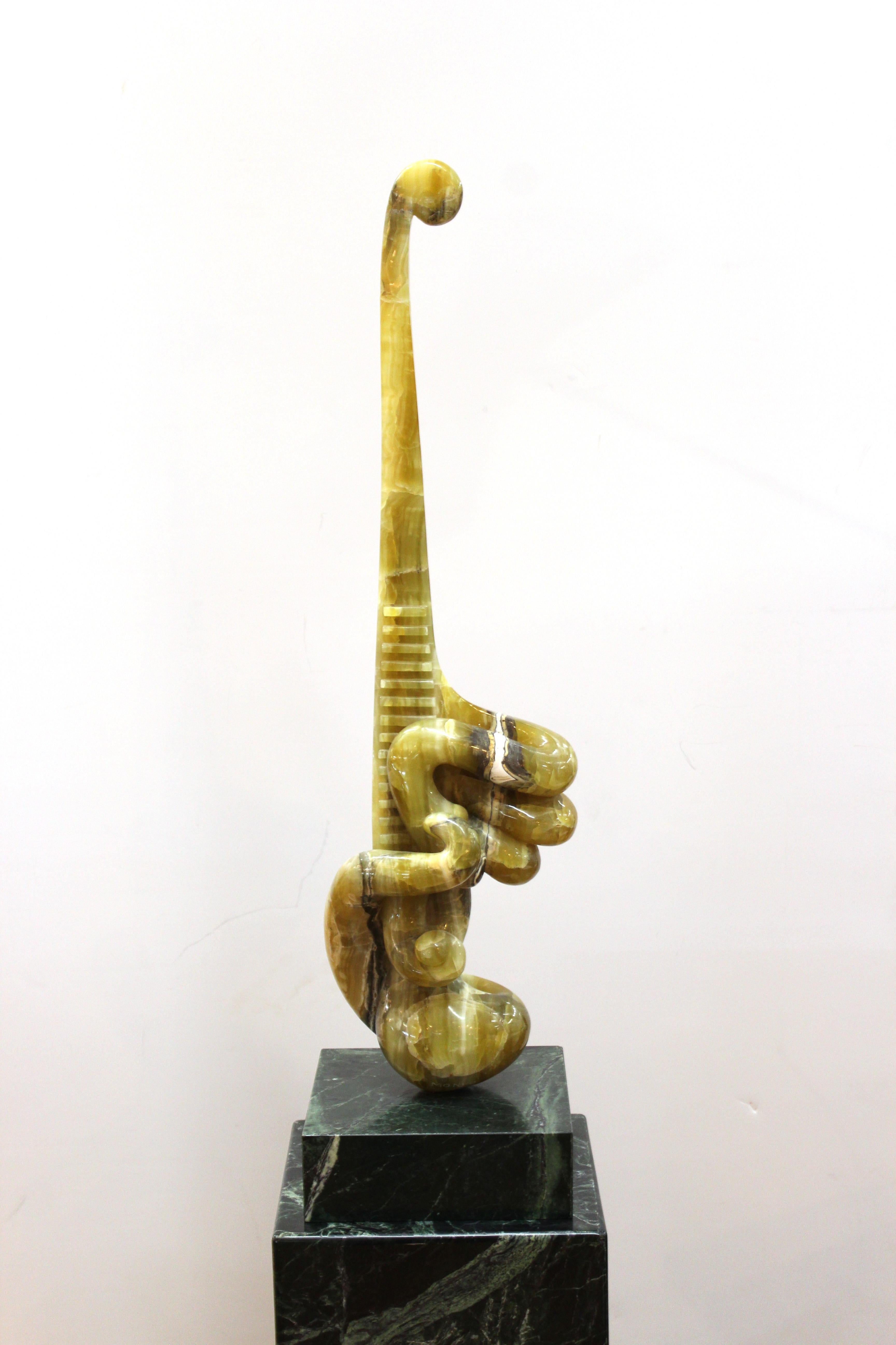 Modern abstract carved marble sculpture by Romanian artist Prince Monyo Mihailescu-Nasturel. The piece has sinuous biomorphic shapes and swags and sits atop a square base, mounted atop a tall marble pedestal. Carved signature on the base of the