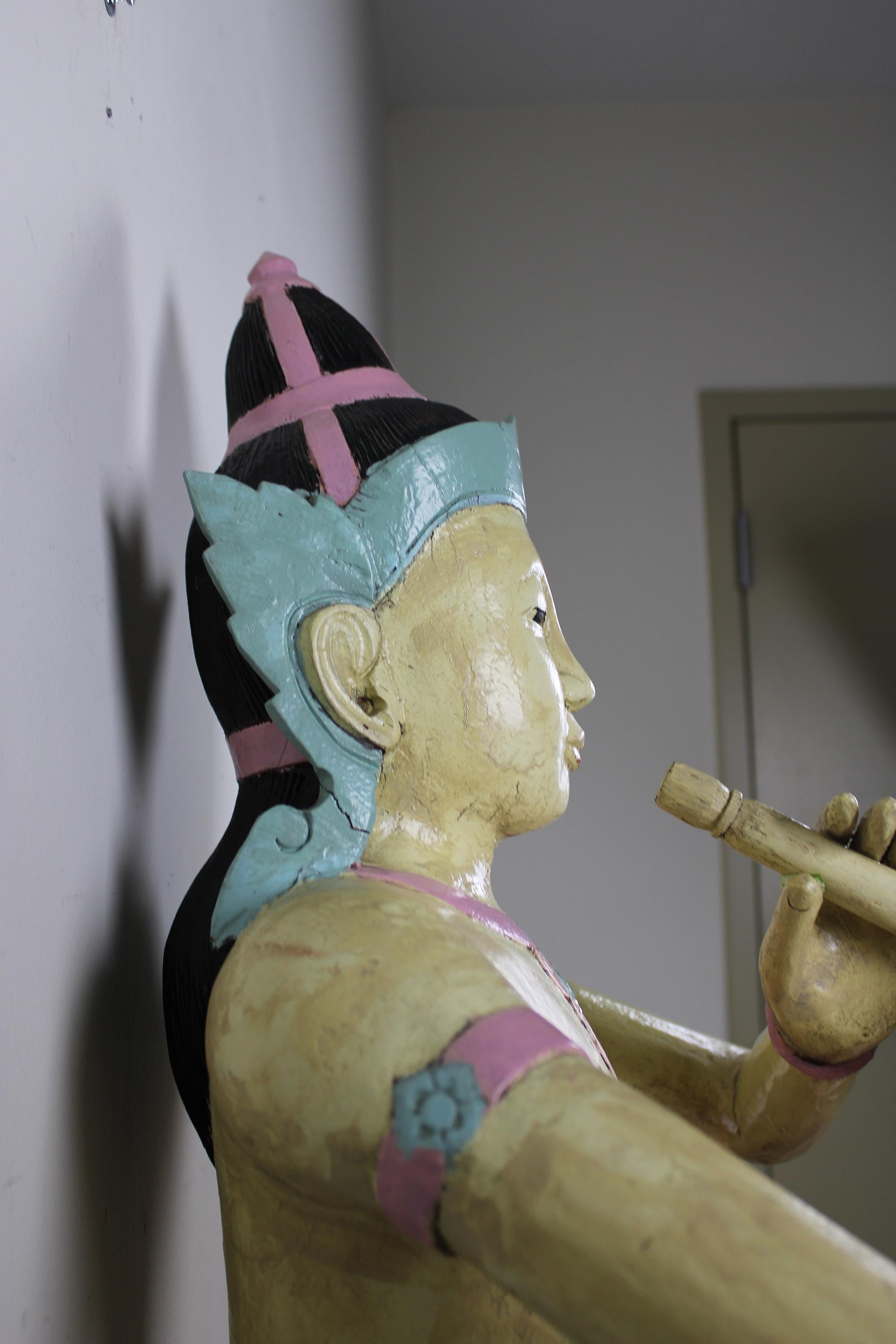 20th Century Prince Phra Aphai Mani Wood Carved Flute Sculpture Thai Diety Kwan Yin