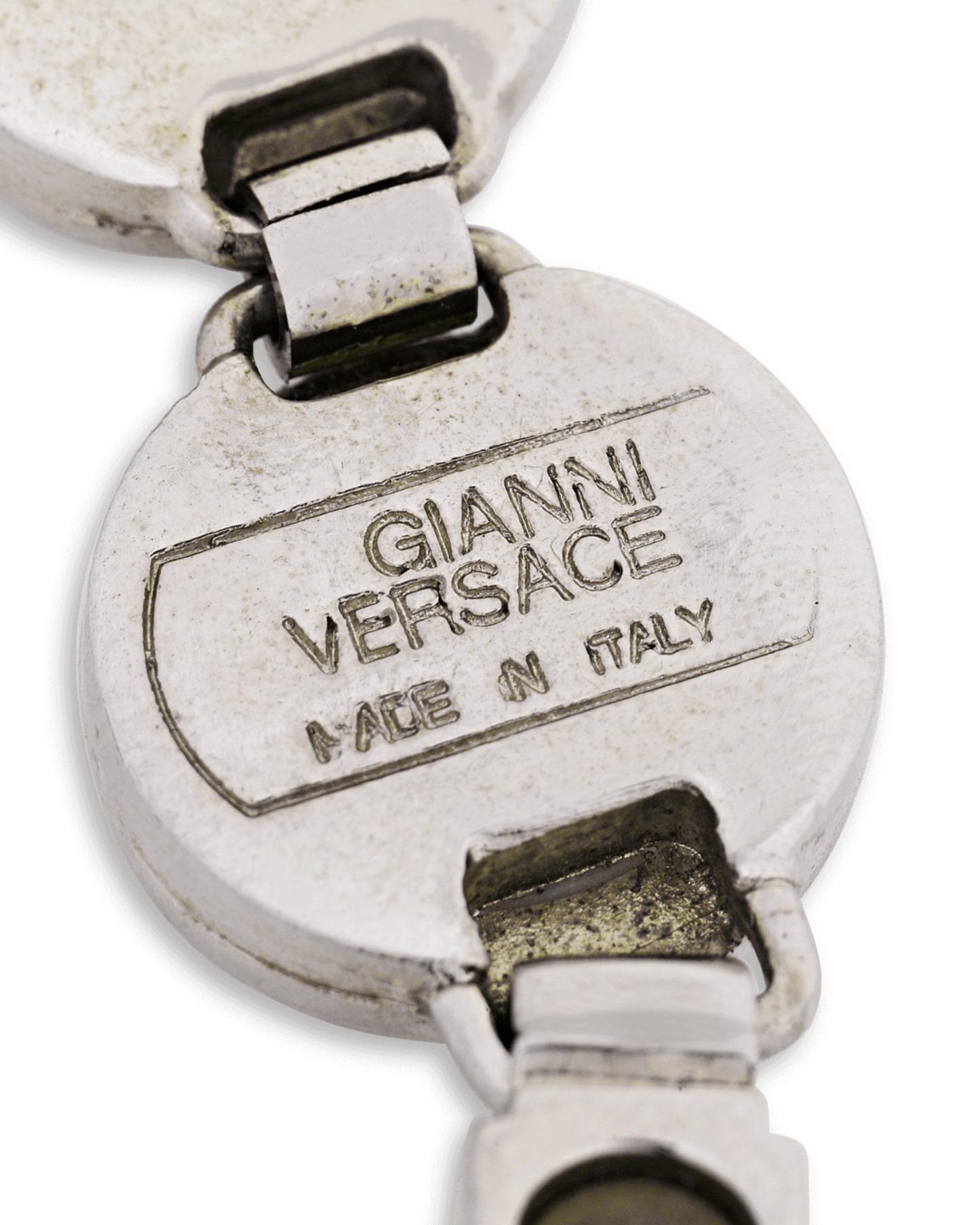 Once owned by the legendary pop star Prince, this exceptional silver colored bracelet by Versace exemplifies both the creative genius of the Italian firm and the unique style of this pop icon. The impressive design incorporates seven medallions that