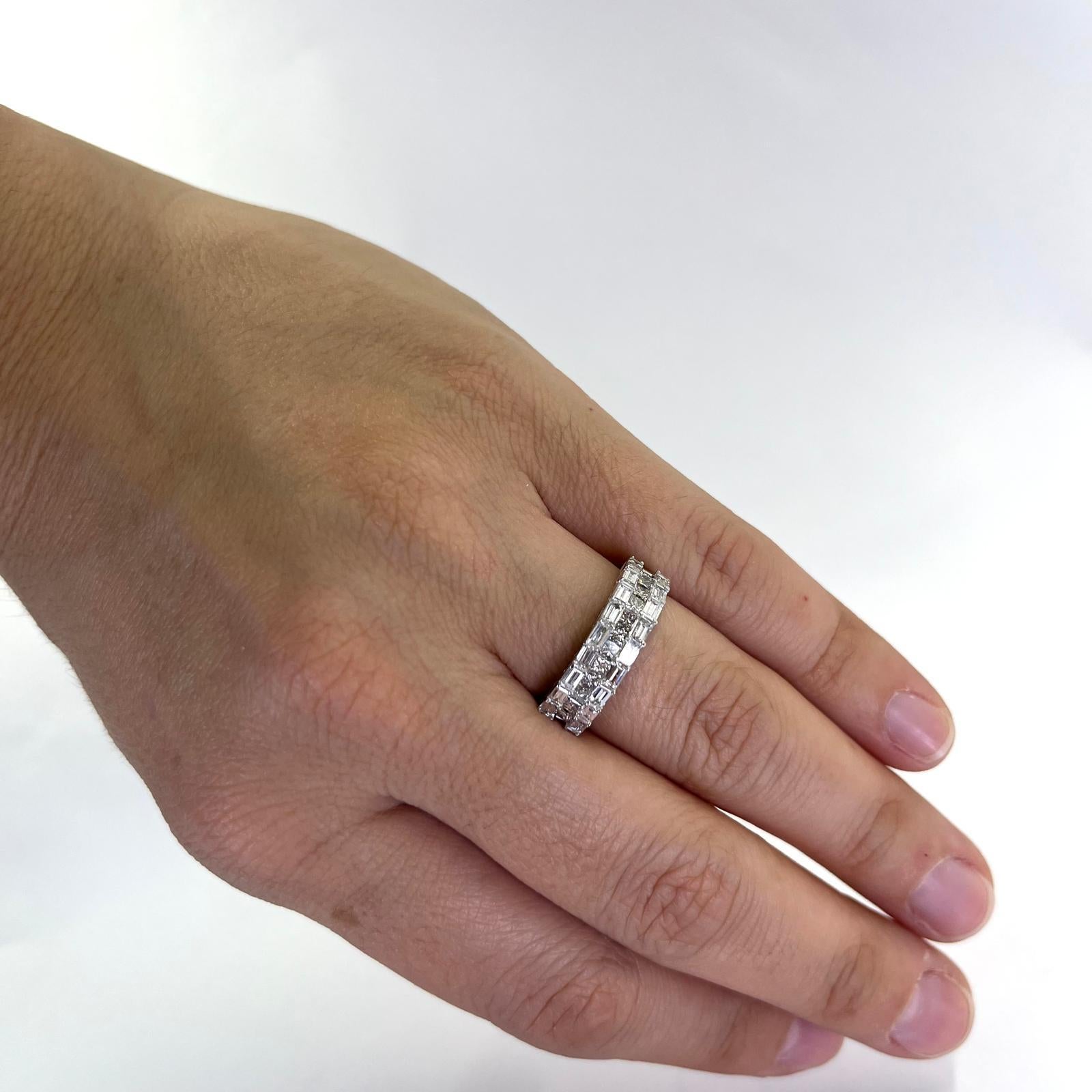 18 Karat White Gold 3 Row Diamond Ring Featuring 18 Baguette Cut Diamonds and 12 Princess Cut Diamonds of SI Clarity and H Color Totaling Approximately 1.75 Carats. Finger Size 5.75. One Sizing Service Included Prior to Shipping, Upon Request.