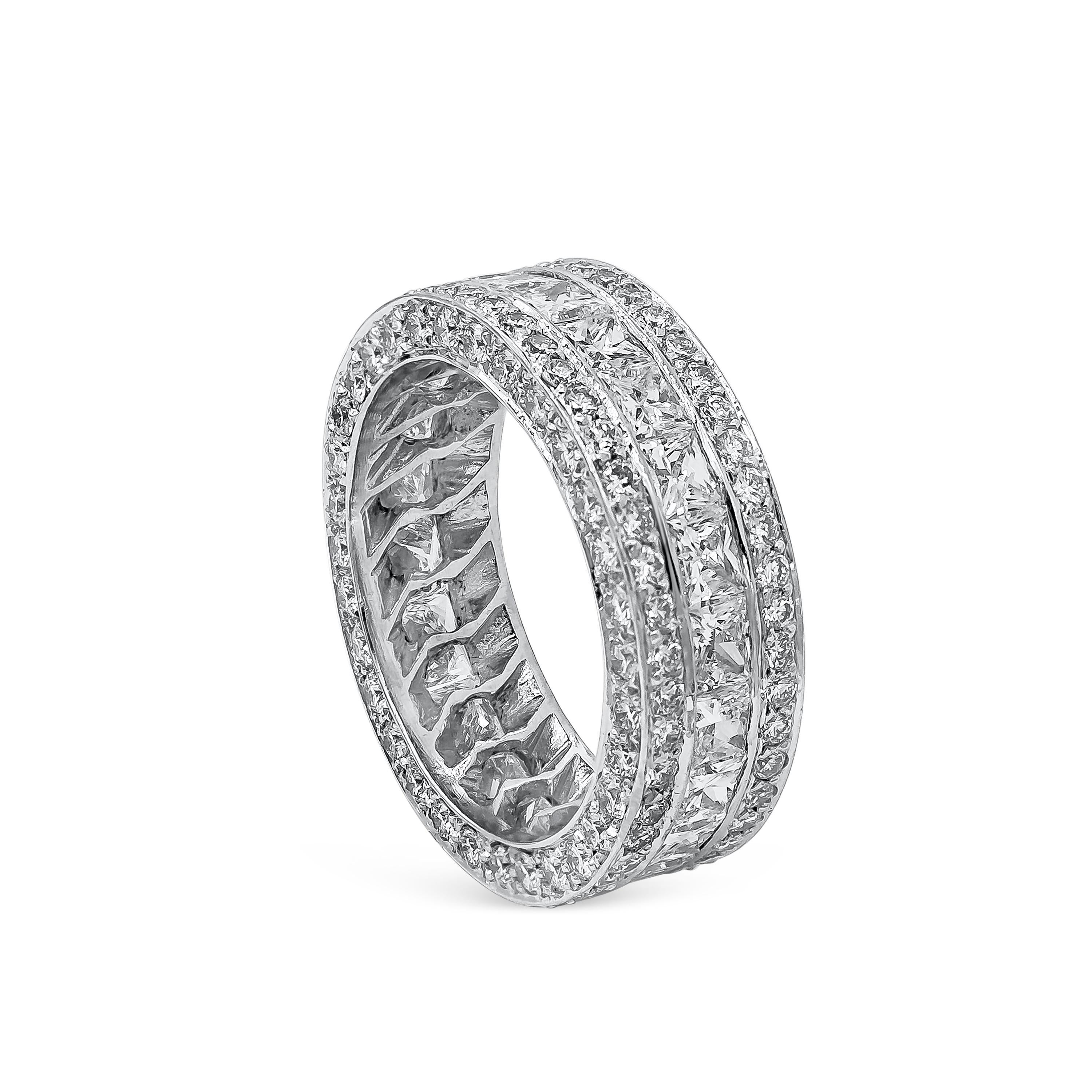 A sparkly ring perfect for special occasions or galas. Showcasing two rows of round brilliant diamonds, spaced by a row of princess cut diamonds. Round diamonds weigh 2.40 carats total, princess cut diamonds weigh 2.75 carats total. Made in polish