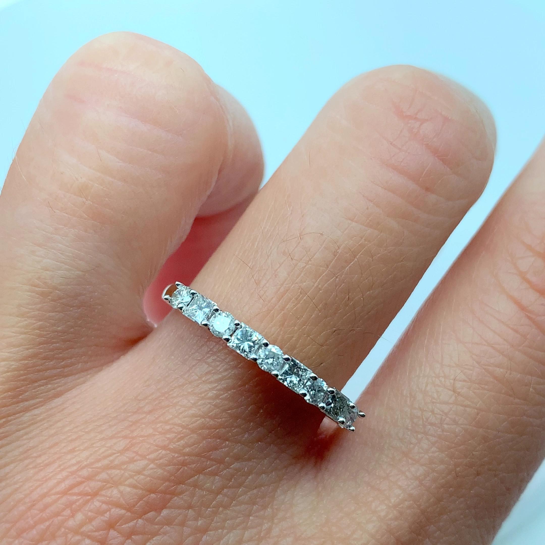 
0.88ct Princess and Round Diamond Eternity Engagement Ring in 9K Yellow Gold. Lovely classic Diamond eternity ring For wedding or as an engagement ring.Diamond total weight 0.88ct F colour, VS1 clarity.Princess cut and Round brilliant cut diamonds