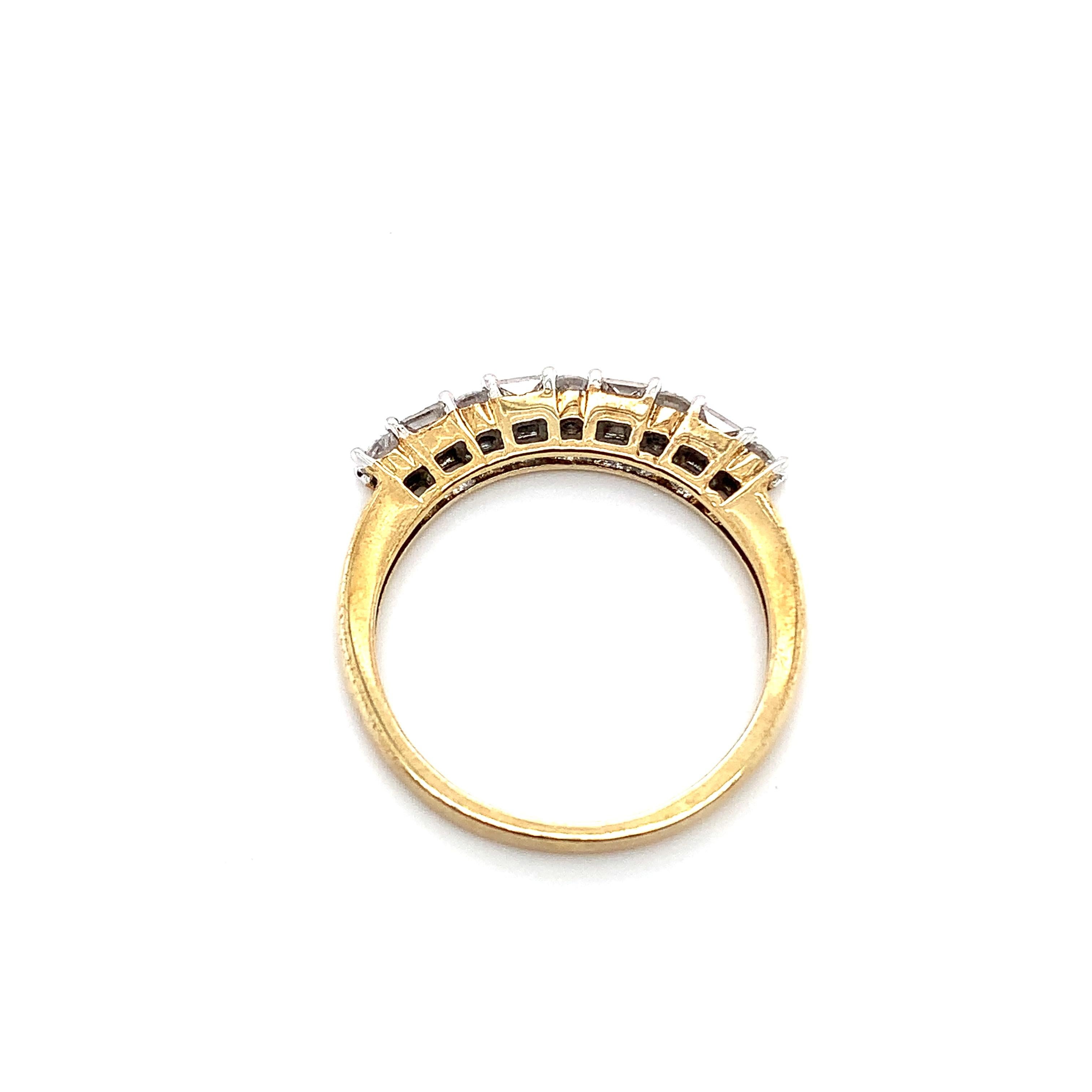 Modern Princess and round diamond eternity engagement ring yellow gold For Sale