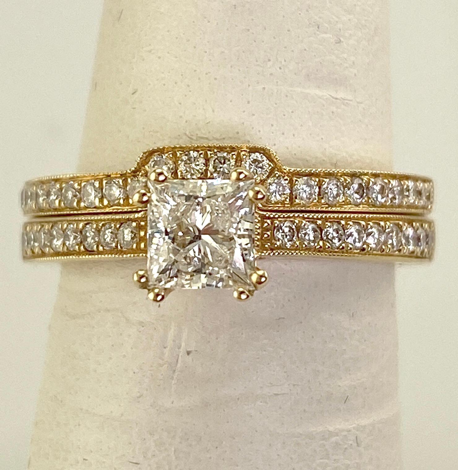 Modern Women's Two Piece Diamond Wedding Set Consisting of a Center Princess Cut Weighing .72 carat. The Quality is SI2; G. Additional Round Diamonds are Set in a Single Row Along the Sides Bringing the Total Weight to 1.09 Carat. The Quality Ranges