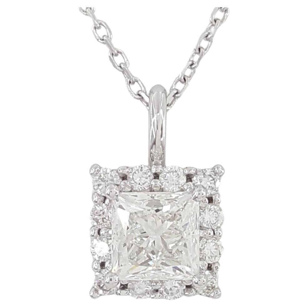 Introducing our elegant 0.97 ct Total Weight Princess Brilliant Cut Diamond Halo Pendant Necklace, crafted in 14K white gold and designed to captivate with its timeless beauty.

The pendant, delicately suspended from an 18-inch chain, weighs 2.7