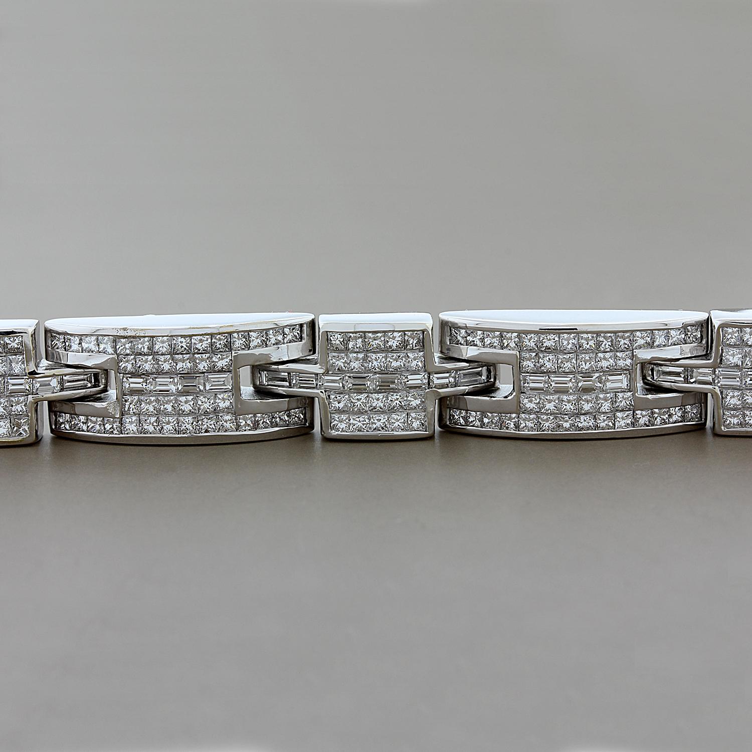 This stunning link bracelet features 17.80 carats of princess and baguette emerald cut diamonds. The diamonds are in an invisible setting in 14K white gold.

Fits wrists up to 8 5/16 inches
Bracelet width: 3/8 inch
