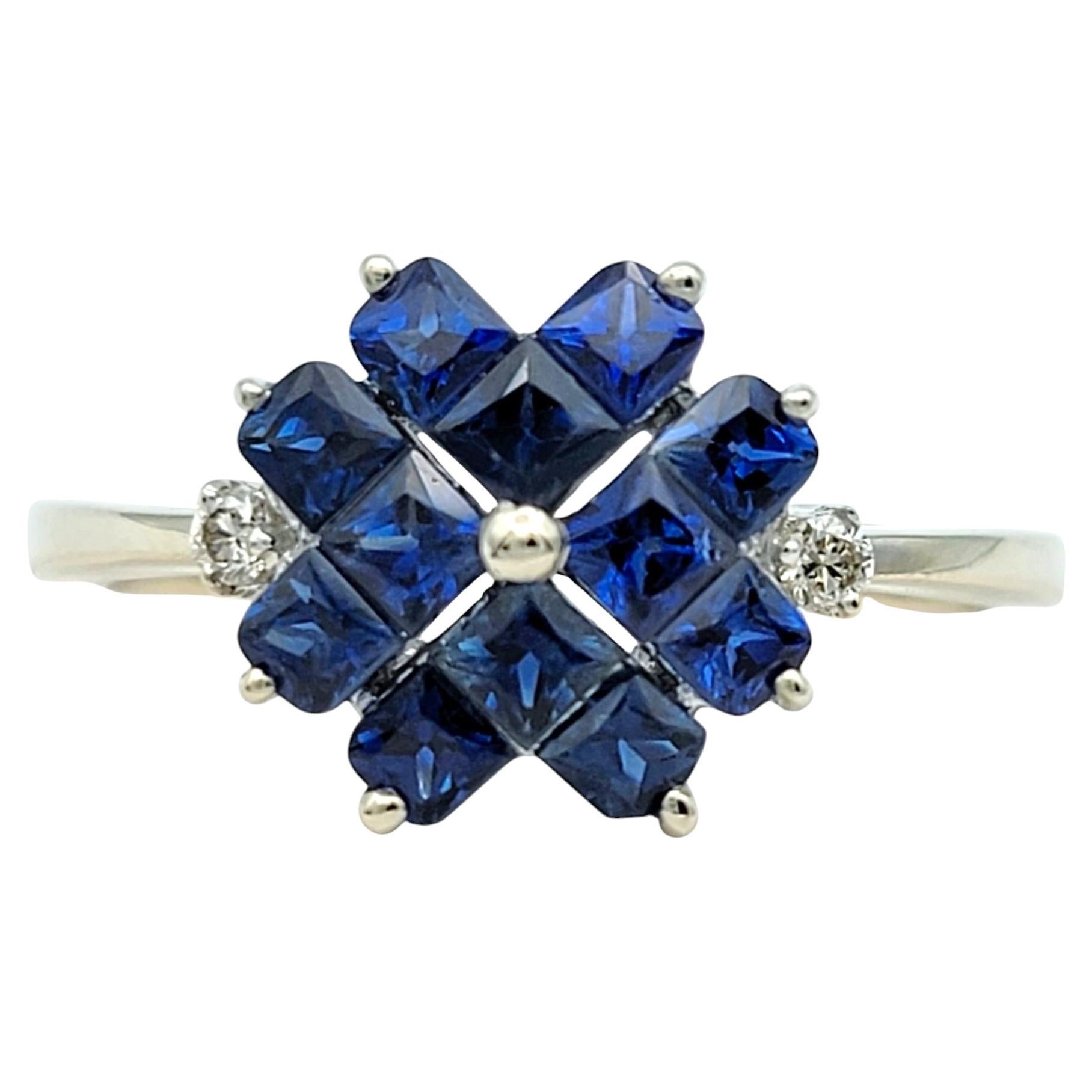 Ring Size: 6.25

This exquisite ring showcases a striking arrangement of deep blue princess-cut sapphires set in a captivating geometric pattern. The bold, structured design of the sapphires creates a mesmerizing visual effect, enhanced by the