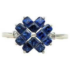 Princess Cut Blue Sapphire and Diamond Flower Motif Ring in 14 Karat White Gold
