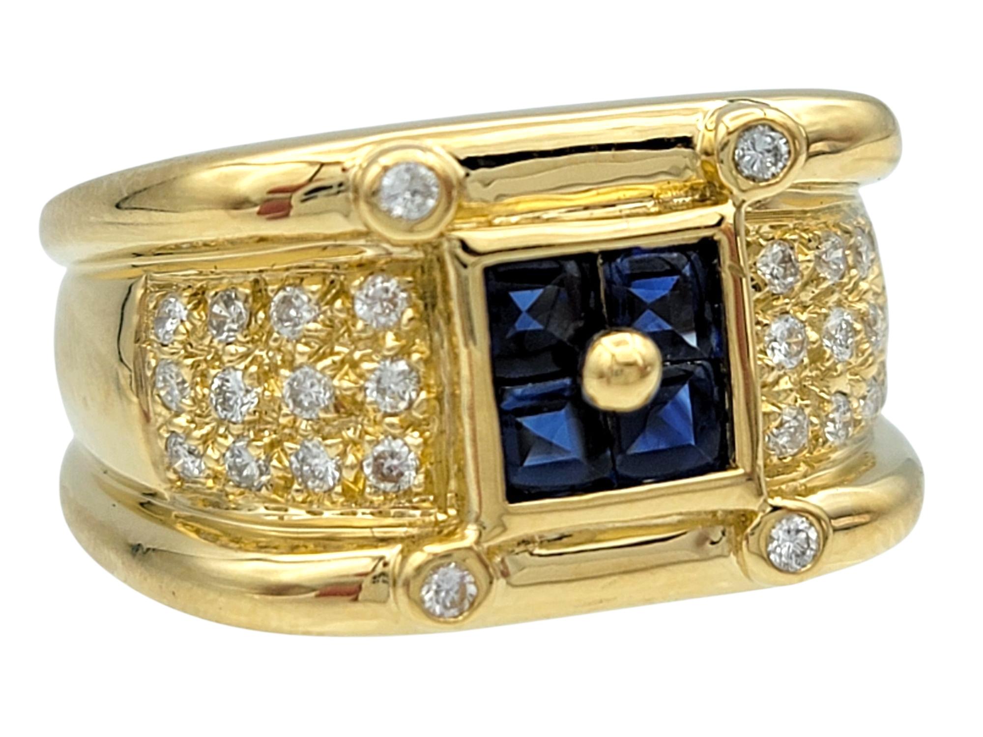 Ring Size: 6.5

This bold ring centers around a 4 vibrant blue princess-cut sapphires, framed in a square setting that draws attention to its rich hue. The wide band is adorned with shimmering round diamonds on both sides, forming a striking