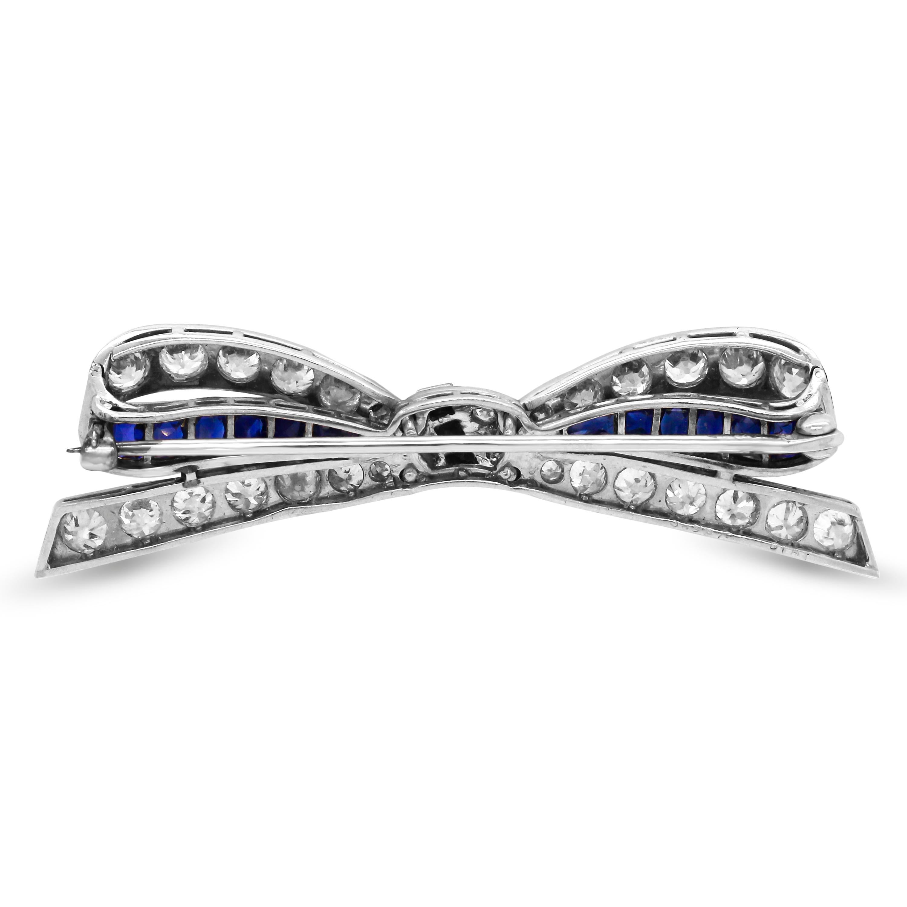 Princess Cut Blue Sapphire Round Diamonds Platinum Antique Ribbon Pin Brooche

This beautiful Antique Brooche is the perfect gift for the lover of everything in ribbon/bow designs

Apprx. 3.00 carat G color, VS clairty diamonds

5.30 carat Blue