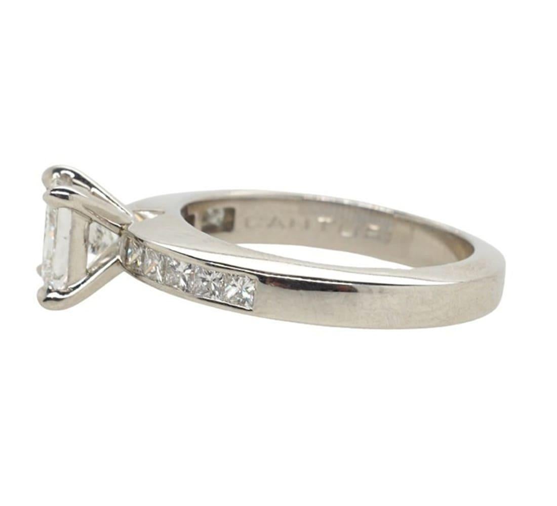 Princess Cut Canturi Diamond Ring with Shoulder Diamonds, Central Princess cut is GIA certified. 

Centre Diamond weight: 1.32 Ct
Colour: F 
Clarity: SI1 
Ring Size L.5.

Condition: Excellent - Refer Images

Markings: Pt