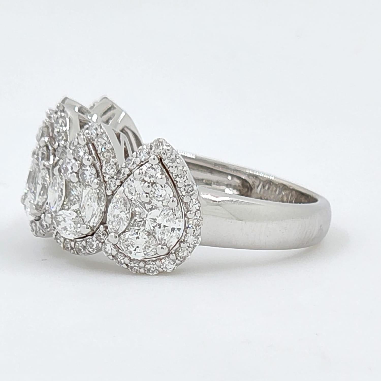 Contemporary Princess Cut Diamond and Pear Cut Diamond Ring in 18 Karat White Gold