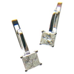 Princess cut diamond earrings 18KT white gold rare modern design and closure 1ct