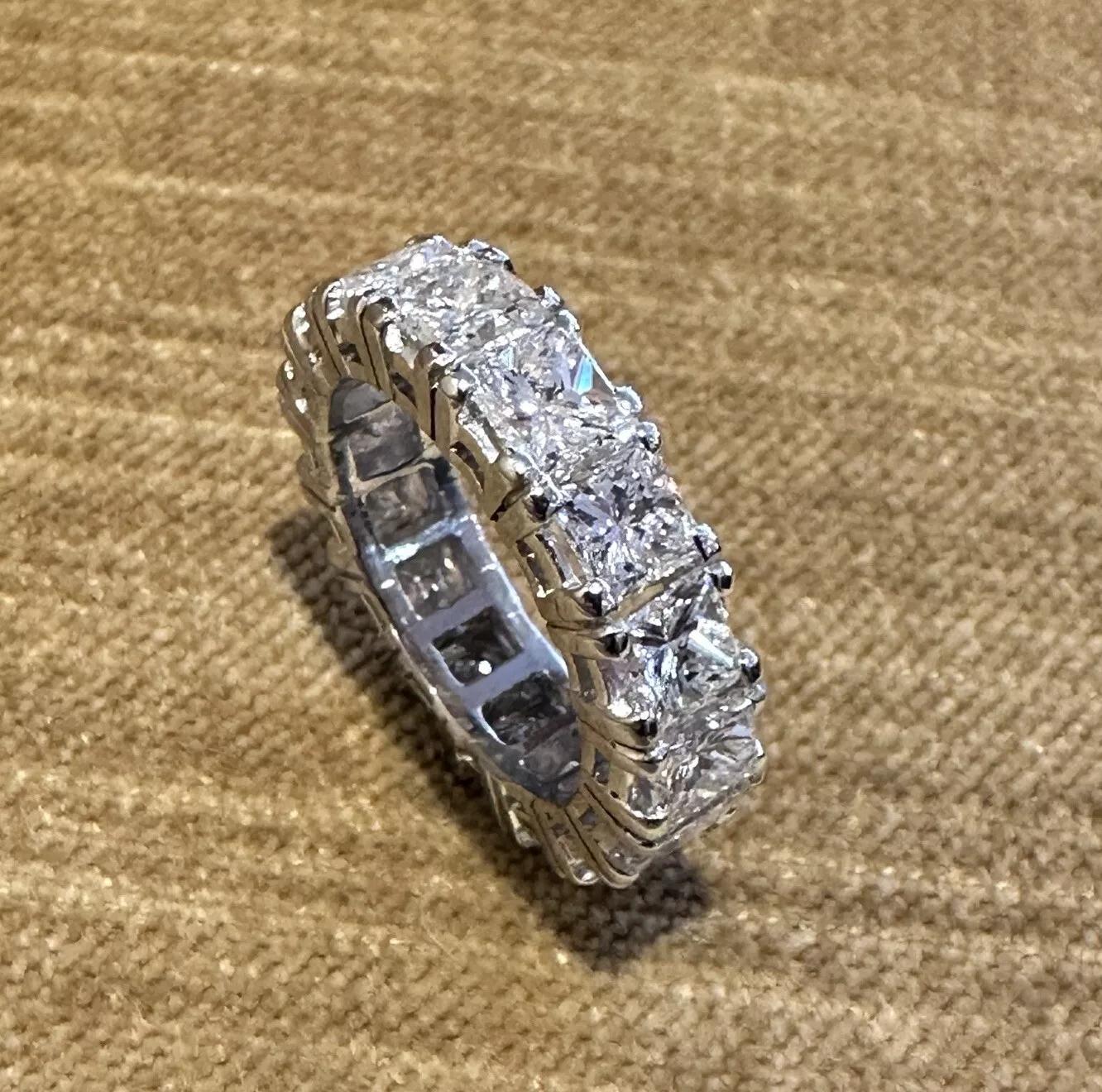 Princess Cut Diamond  Eternity Ring 8.00 cttw Size 6 in Platinum

Diamond Eternity Band features 16 Princess cut Natural Diamonds weighing 8.00 carats in total, all prong set in Platinum.

Total diamond weight is 8.00 carats.
Ring size is 6
The ring