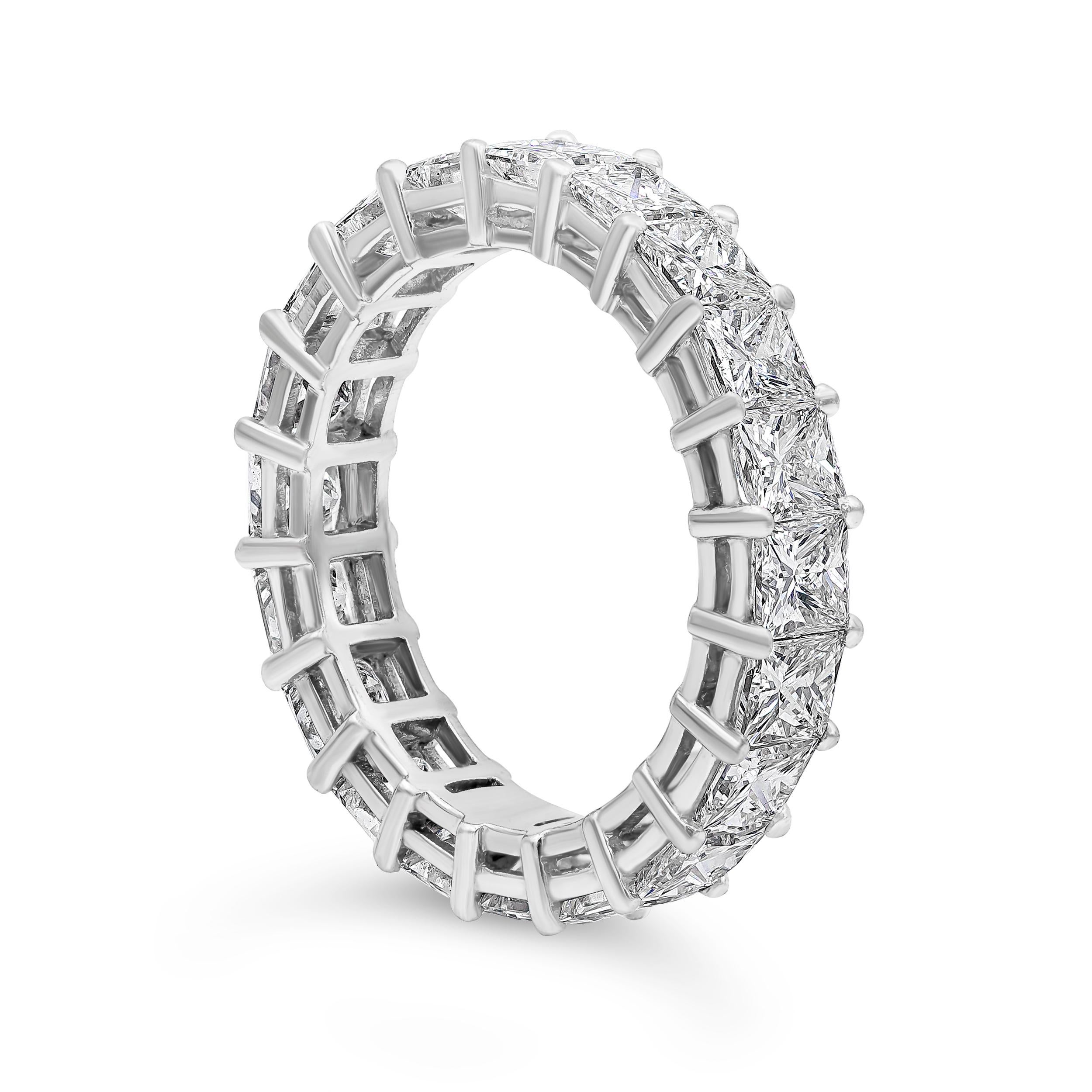 A brilliant eternity wedding band made in platinum showcasing a row of princess cut diamonds weighing 4.39 carats total. Size 6.25 US.

Roman Malakov is a custom house, specializing in creating anything you can imagine. If you would like to receive