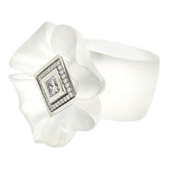 Princess Cut Diamond Heart of 0.53 Carat of a Flower in a Perspex Ring