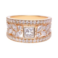 Einzigartiger Ring aus 18 Karat Gelbgold mit Diamant im Prinzessinnenschliff und Diamant im Marquiseschliff