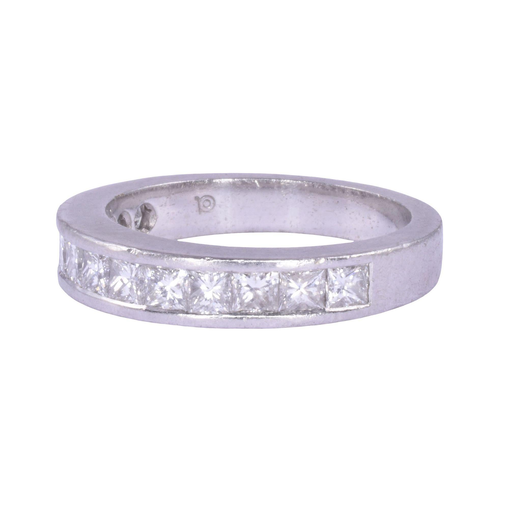 Estate princess cut diamond platinum band. This platinum band features 1.07 carat total weight of princess cut diamonds with VS1-2 clarity and H-I color. This platinum diamond band weighs 6.56 grams, is a size 5.25, and is appraised at $4,000. [KIMH