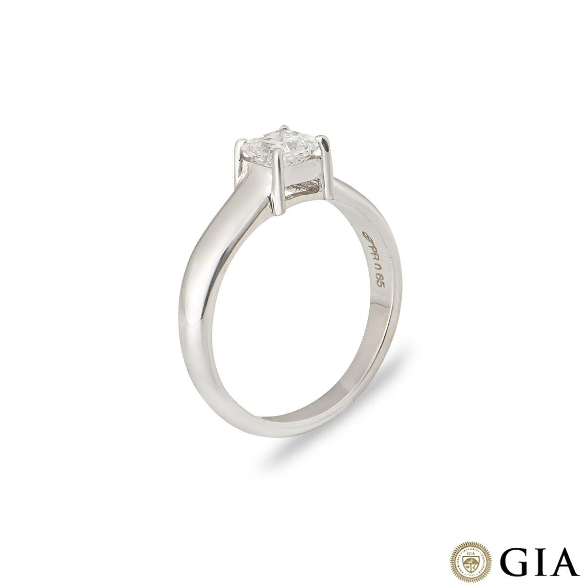 An elegant 18k white gold diamond engagement ring. The claw set princess cut diamond weighs 0.65ct, is F colour and VS1 in clarity. The diamond is set in a tapered band measuring 4mm at the widest point and 2mm at the back. The ring is currently a