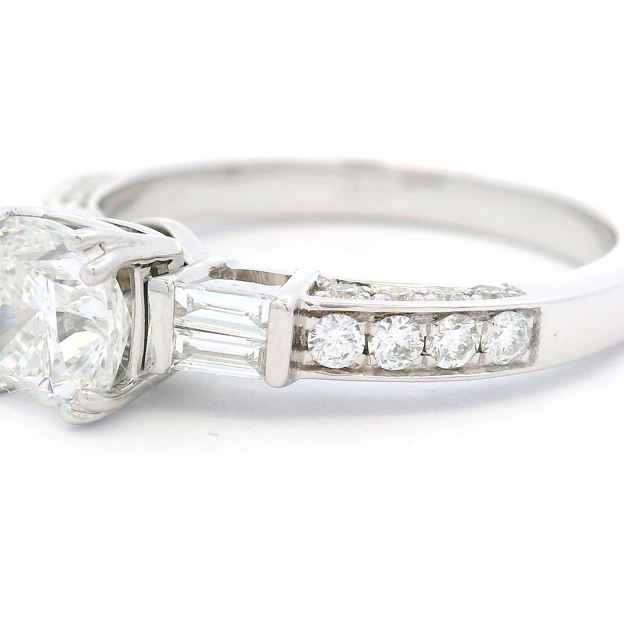Diamond ring in 14K white gold featuring a 1.00-carat princess-cut center diamond, flanked by baguette side stones and round brilliant diamonds along the band. The mix of cuts creates visual structure and sparkle from every angle. With its clean