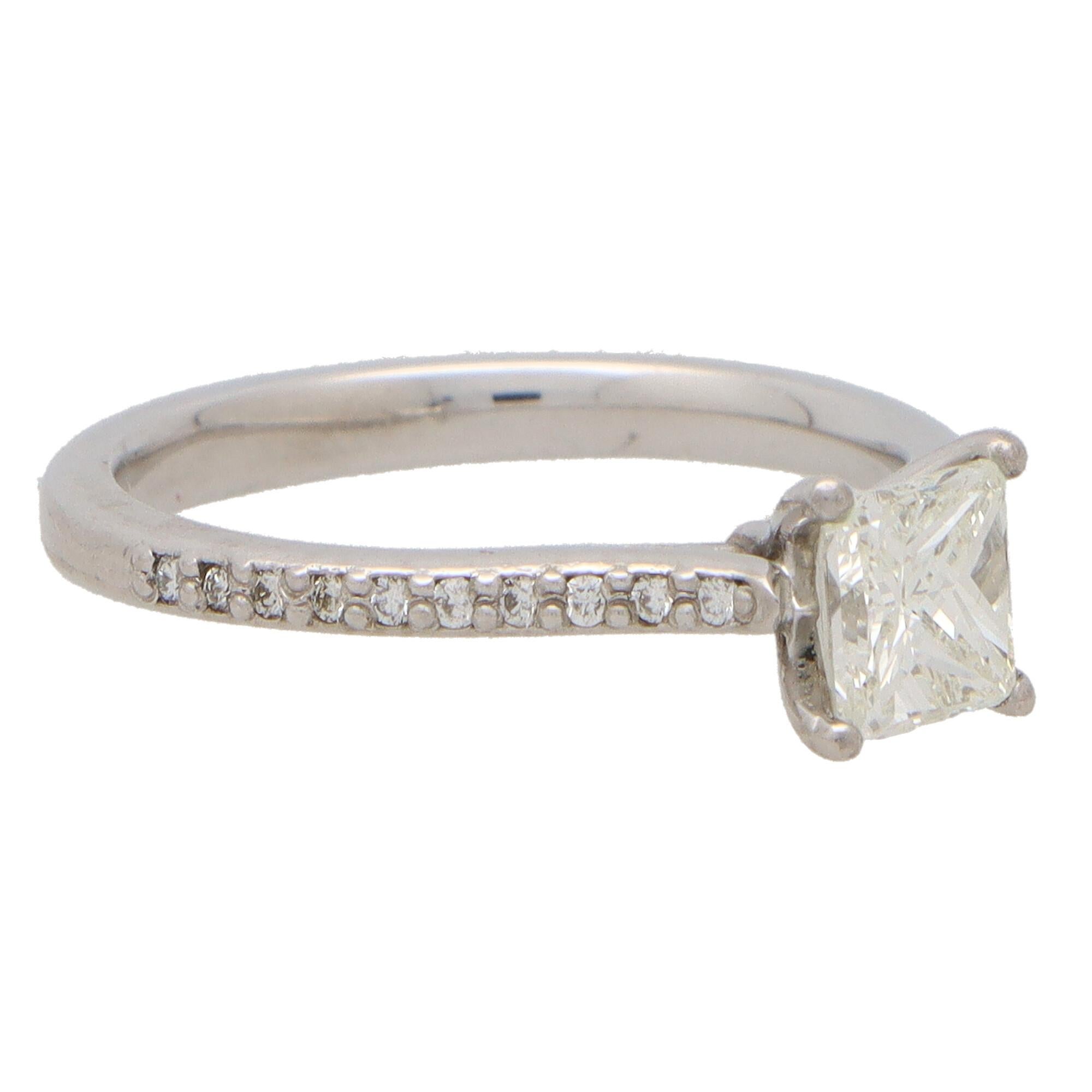 Princess Cut Diamond Solitaire Ring With Diamond Shoulders Set in Platinum In New Condition For Sale In London, GB