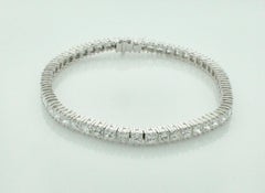 Bracciale tennis con diamanti taglio Princess in 18 carati 9,40 carati