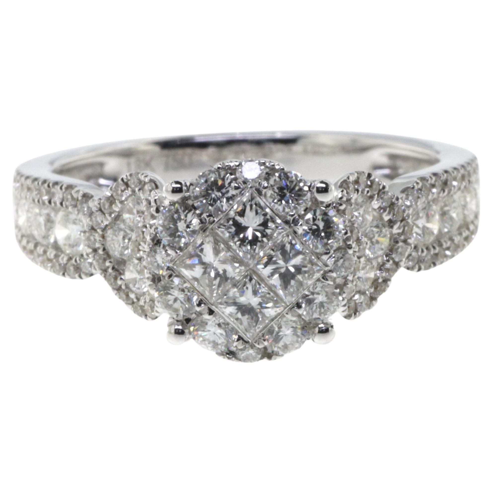 A mesmerizing blend of elegance and modern design, this 18 karat white gold ring offers an artful portrayal of luxury and finesse. The centerpiece, an illusion cluster of Princess Cut Diamonds weighing a total of 0.30 carats, captivates with its