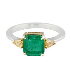 Princess Cut Emerald and Pear Shape Yellow Diamond Ring in 18 Karat Gold
