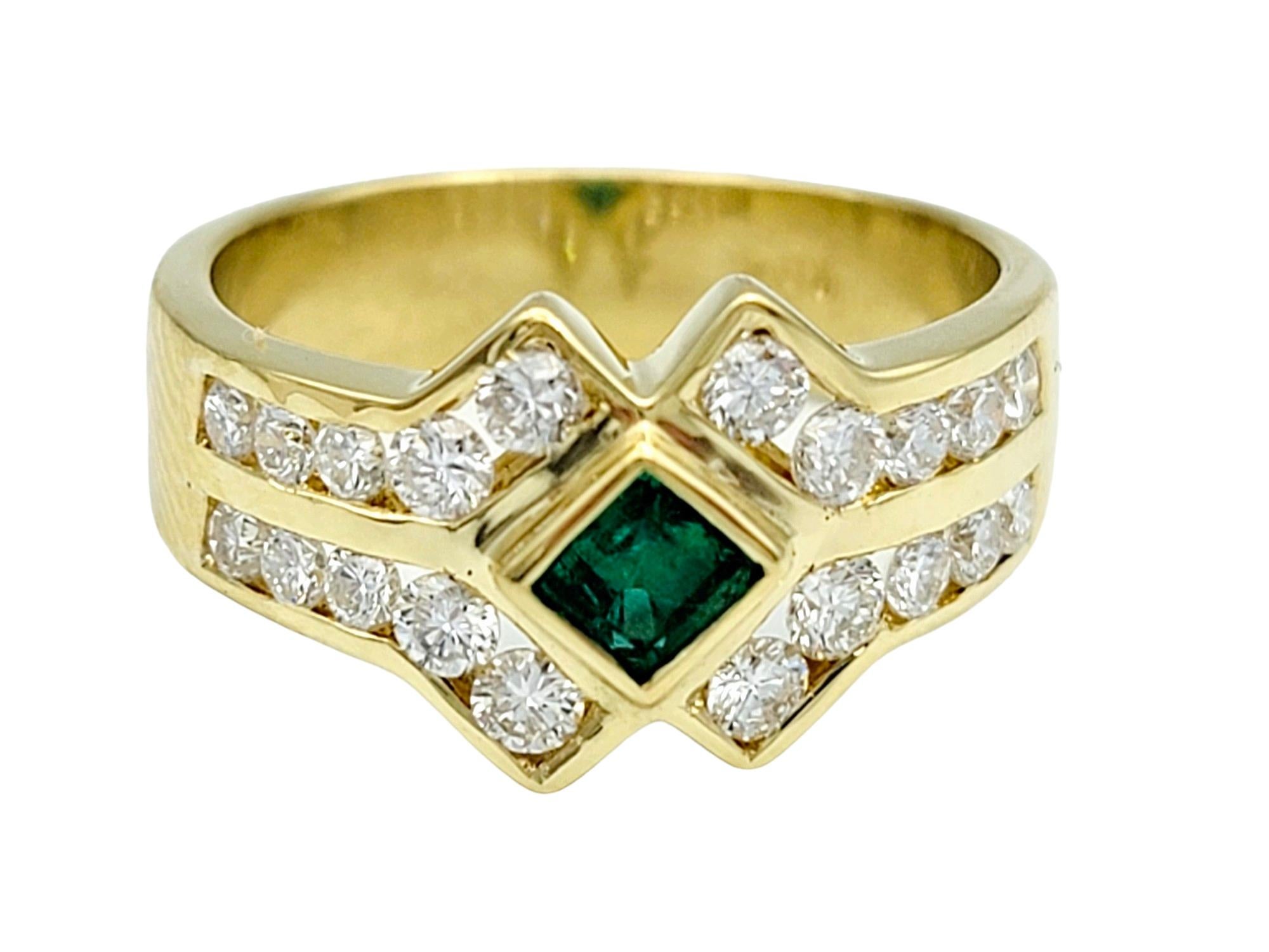 Ring Size: 5.75

This unique emerald and diamond band ring exudes sophistication and elegance. Set in 18 karat yellow gold, it features a striking pairing of a square-cut emerald and sparkling round diamonds. 

With its modern design and luxurious
