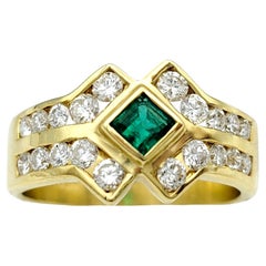 Mehrreihiger Ring mit Smaragd im Prinzessinnenschliff und rundem Diamant aus 18 Karat Gold