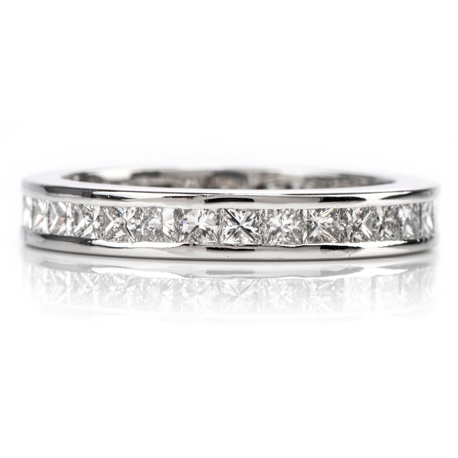 A wedding band ring with a contemporary update. Crafted in Platinum, this ring boasts of fire and brilliance  as the light hits any of the 31 princess cut channel set diamonds.

Diamonds weigh appx. 1.66 carats and are 

graded as H-I color and